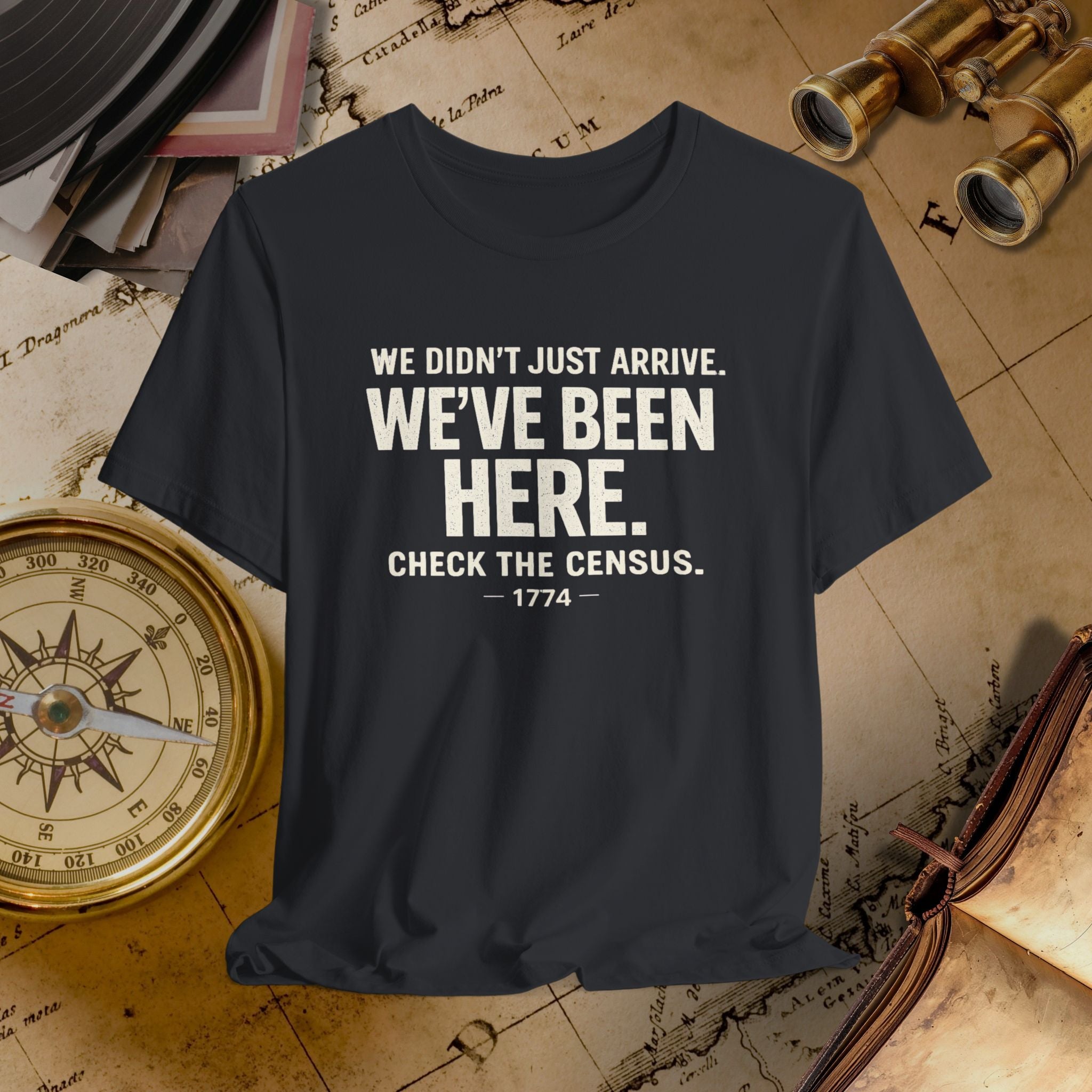 Black t-shirt with humorous text on a vintage map background