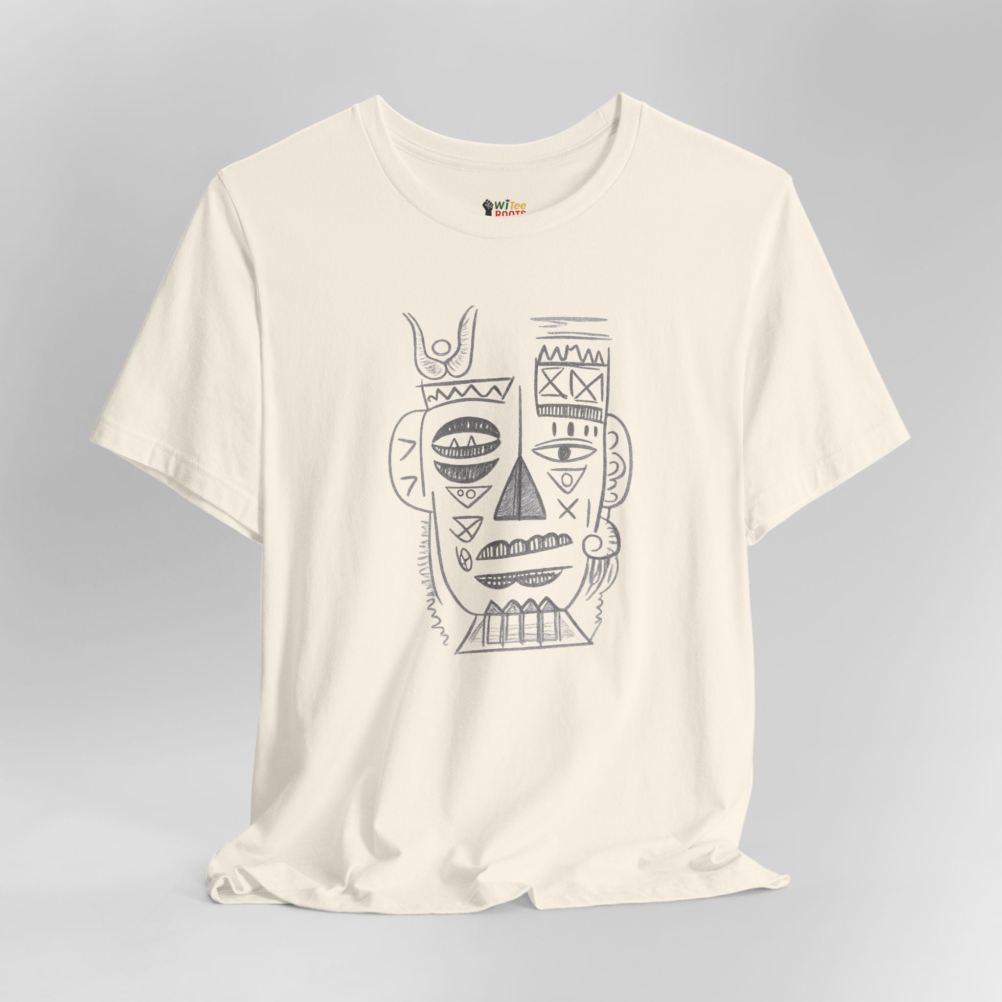 Cream  t-shirt with a black abstract face design on a gray background