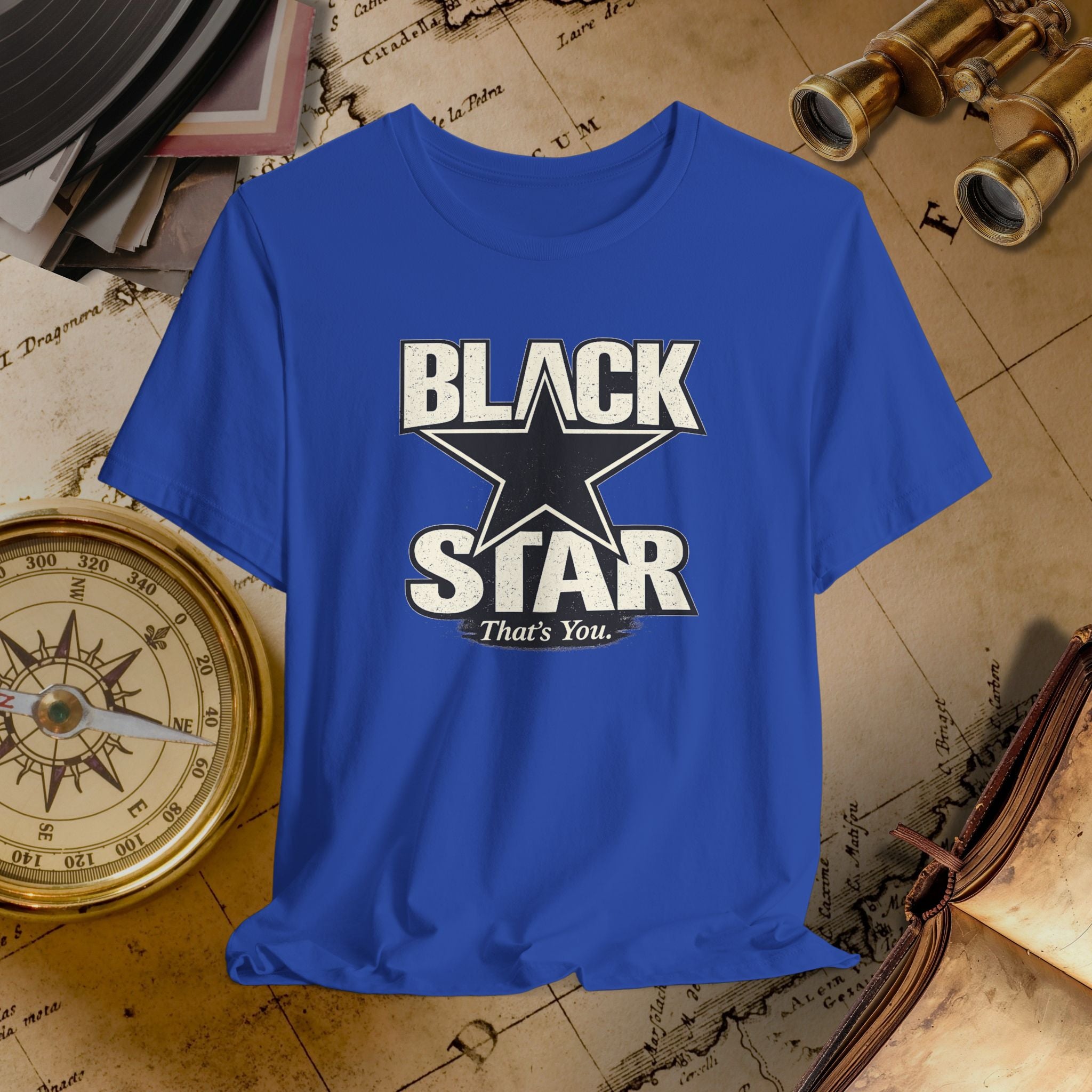 Blue t-shirt with 'Black Star That's You' design on a vintage map background