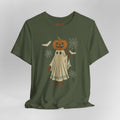 An olive green short-sleeve t-shirt with a Halloween graphic of a ghost with a jack-o'-lantern head, surrounded by bats, spiderwebs, and cobwebs on a light gray background.