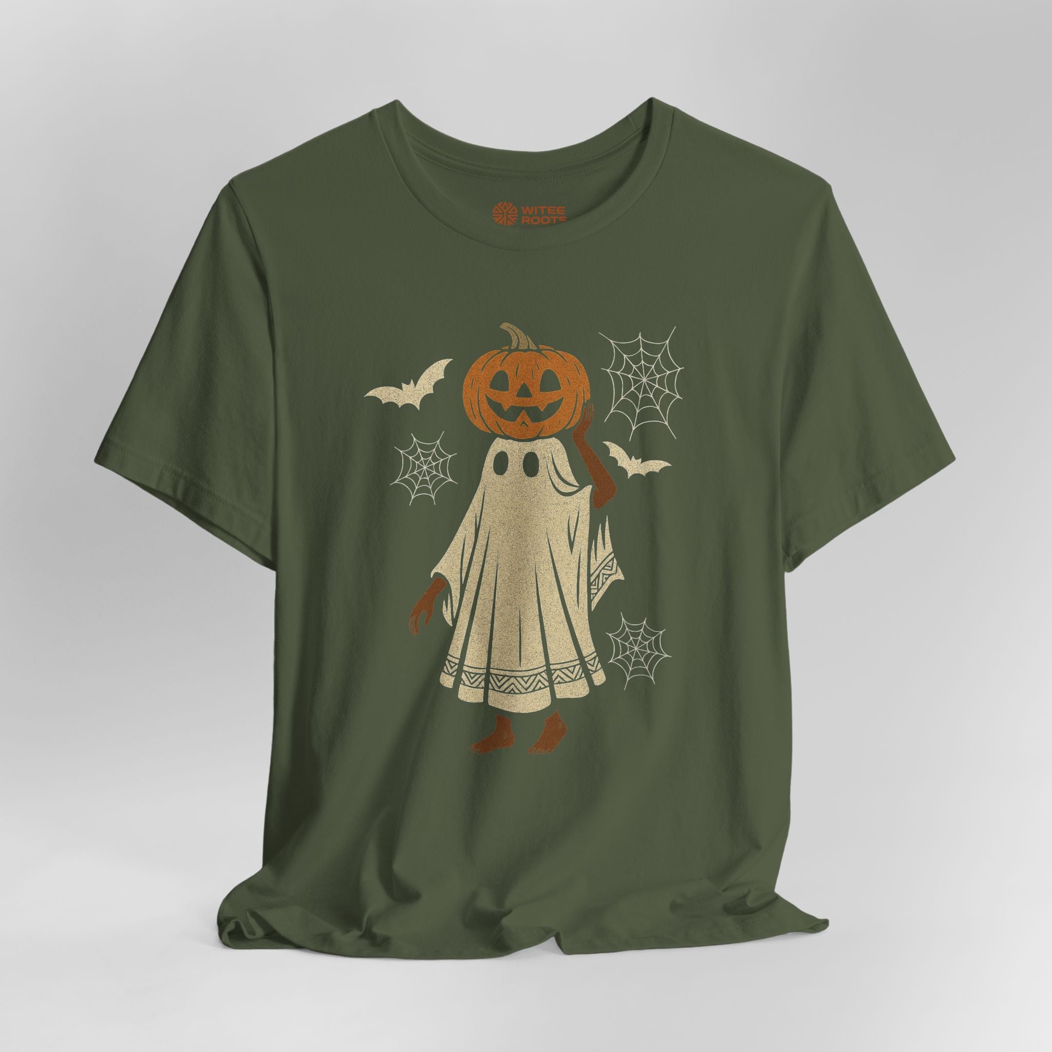 An olive green short-sleeve t-shirt with a Halloween graphic of a ghost with a jack-o'-lantern head, surrounded by bats, spiderwebs, and cobwebs on a light gray background.