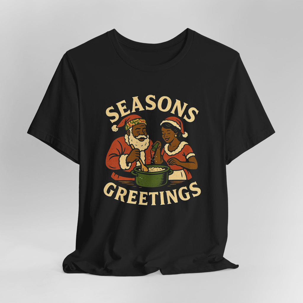 Black t-shirt with 'Seasons Greetings' graphic featuring two people in Santa hats on a gray background