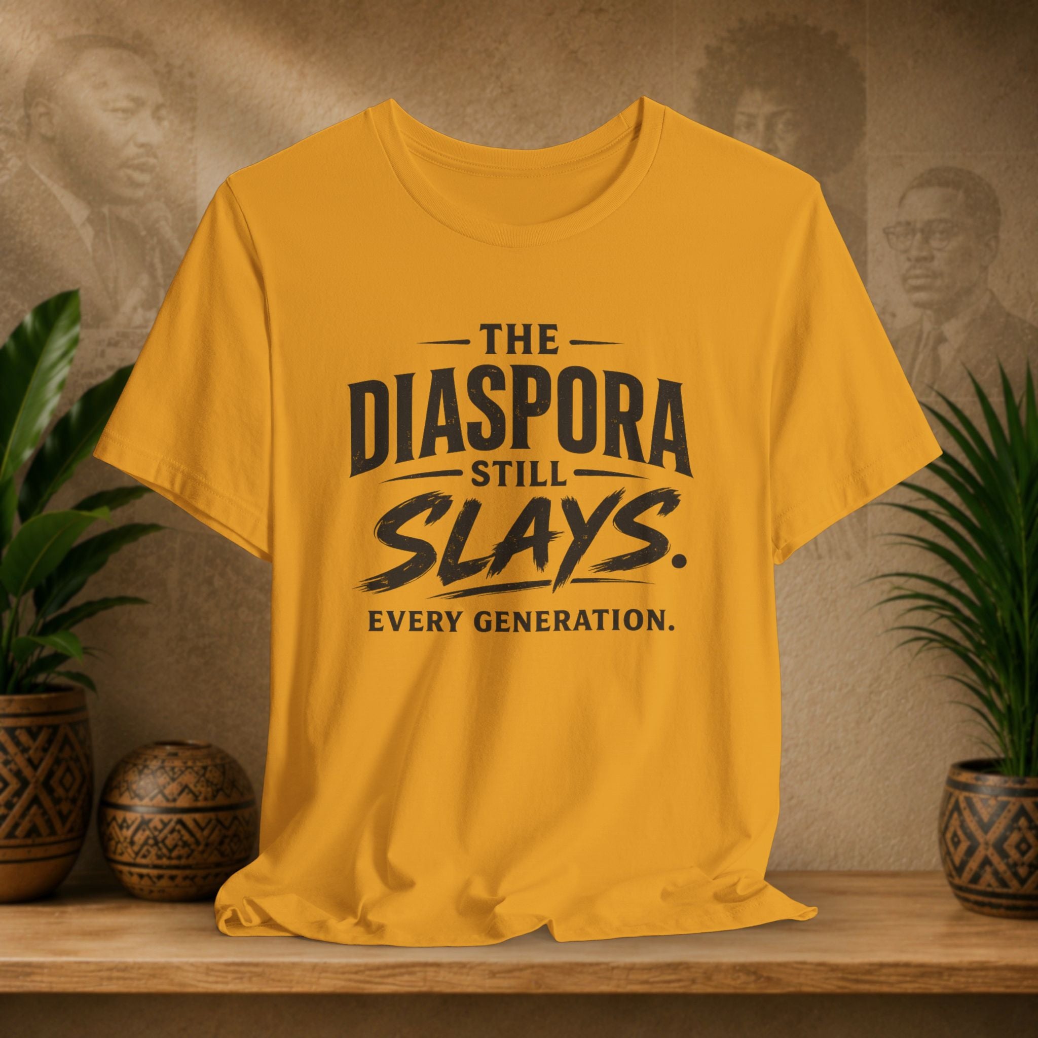 Yellow t-shirt with 'The Diaspora Still Slays. Every Generation.