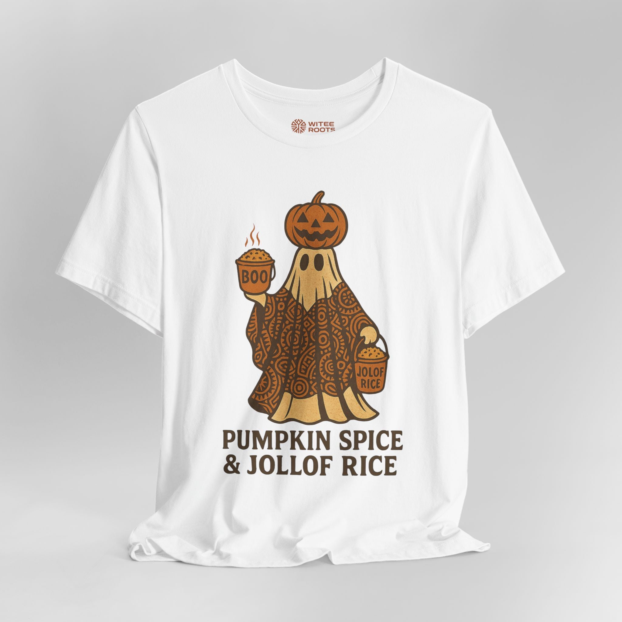 A white short-sleeve t-shirt with a graphic of a ghost in a patterned robe holding a cup of pumpkin spice latte and a bucket of jollof rice, with the text 'PUMPKIN SPICE & JOLLOF RICE' below it. The inner neck label shows the brand 'BUTTER FLIGHT'.