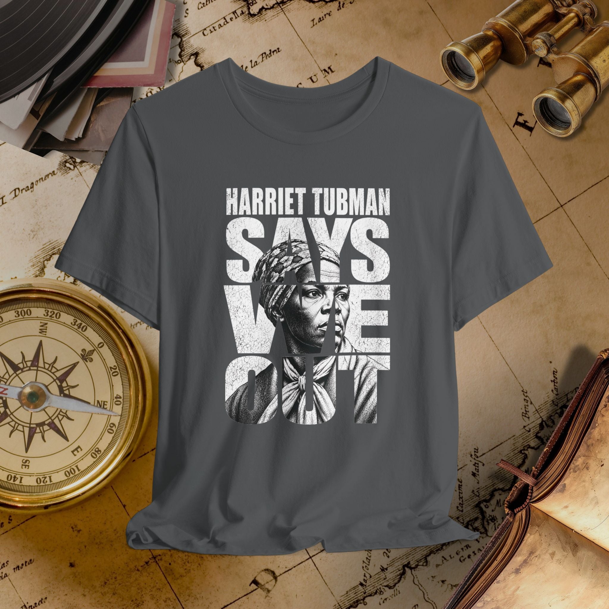 Gray t-shirt with Harriet Tubman graphic and text on a vintage map background