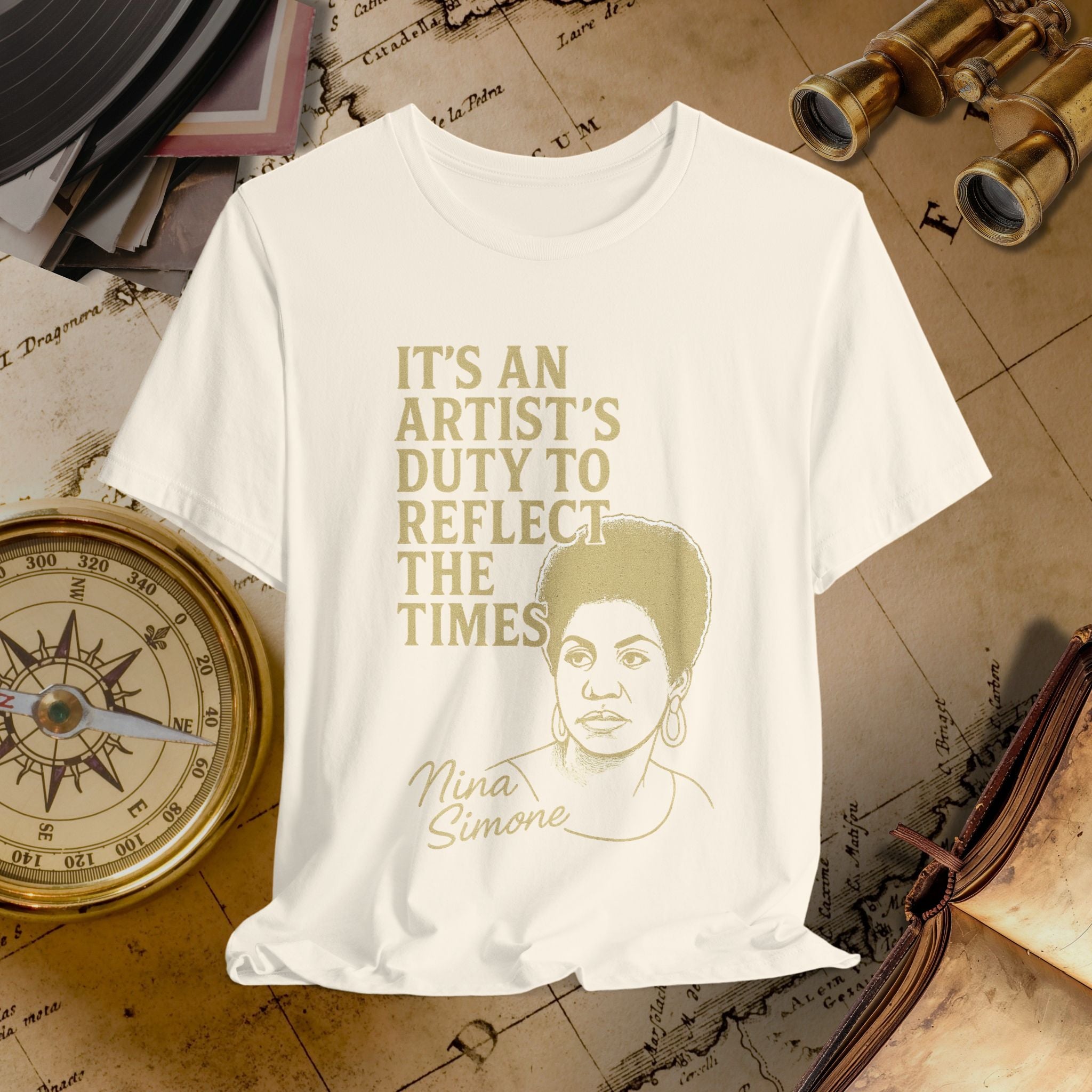 Beige t-shirt with gold text and portrait on a vintage background