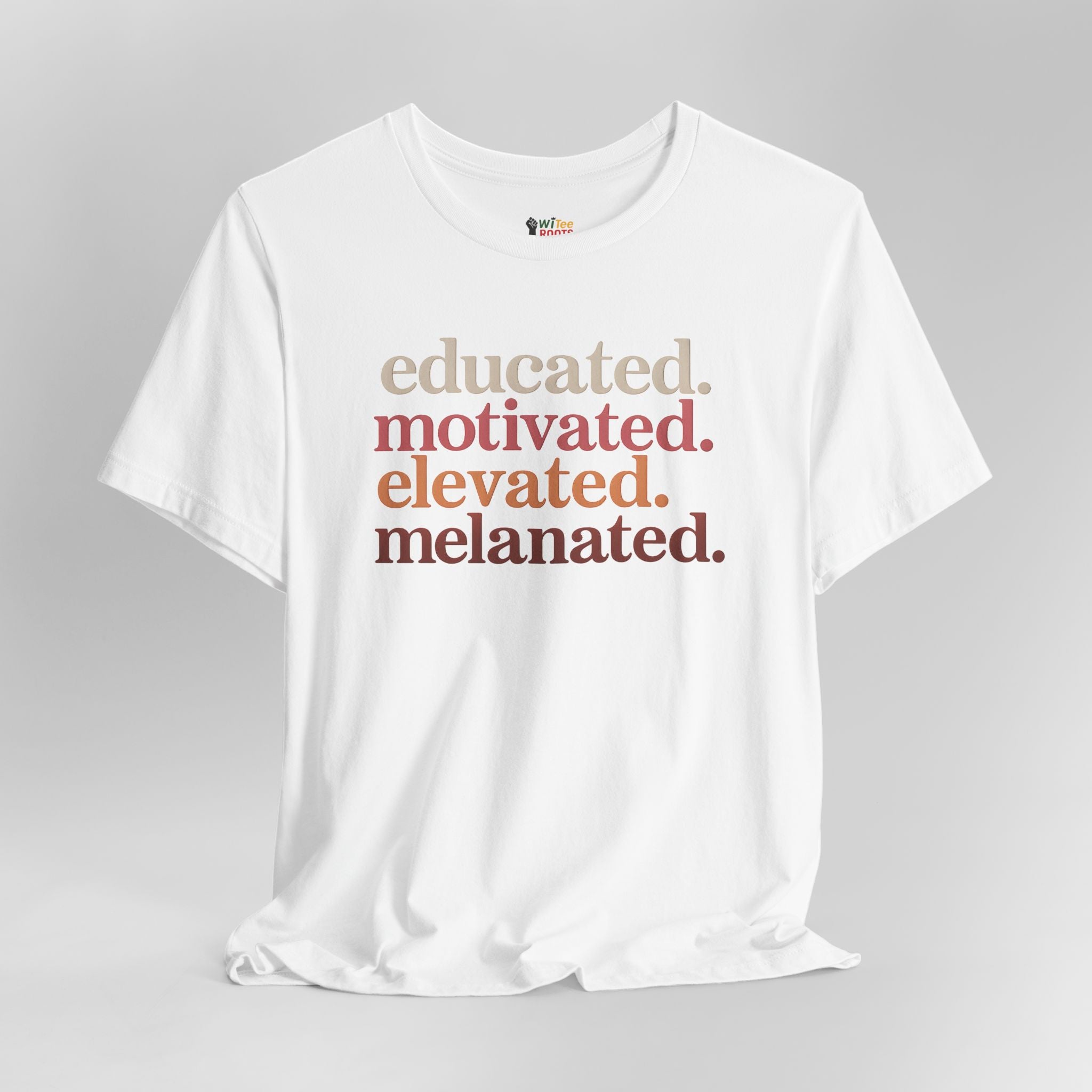 White t-shirt with motivational text on a gray background