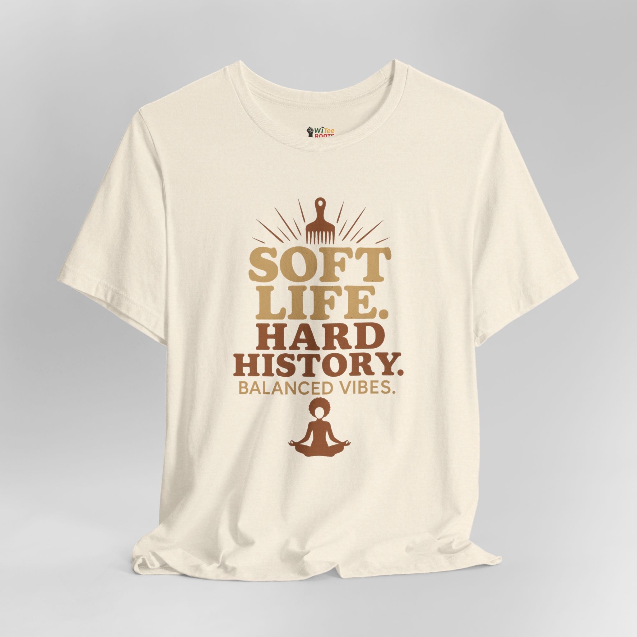 Beige t-shirt with brown text and graphics on a gray background