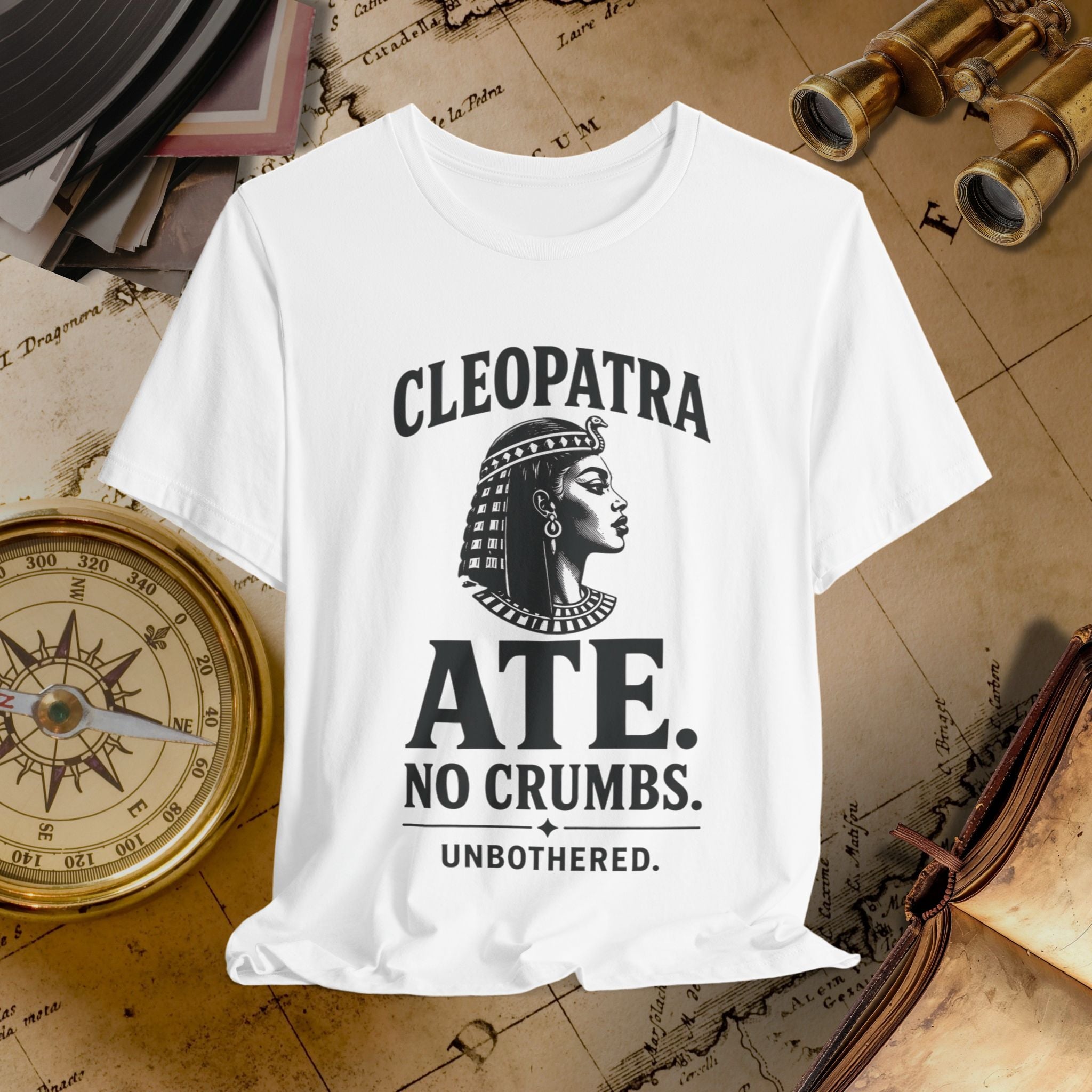 White t-shirt with Cleopatra graphic and text on a vintage background