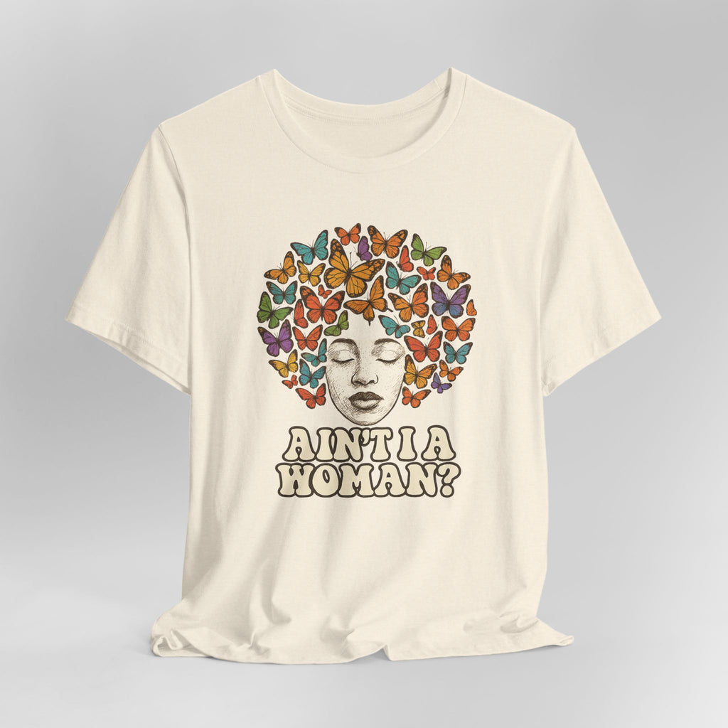 Beige t-shirt with a colorful butterfly design and text on a gray background
