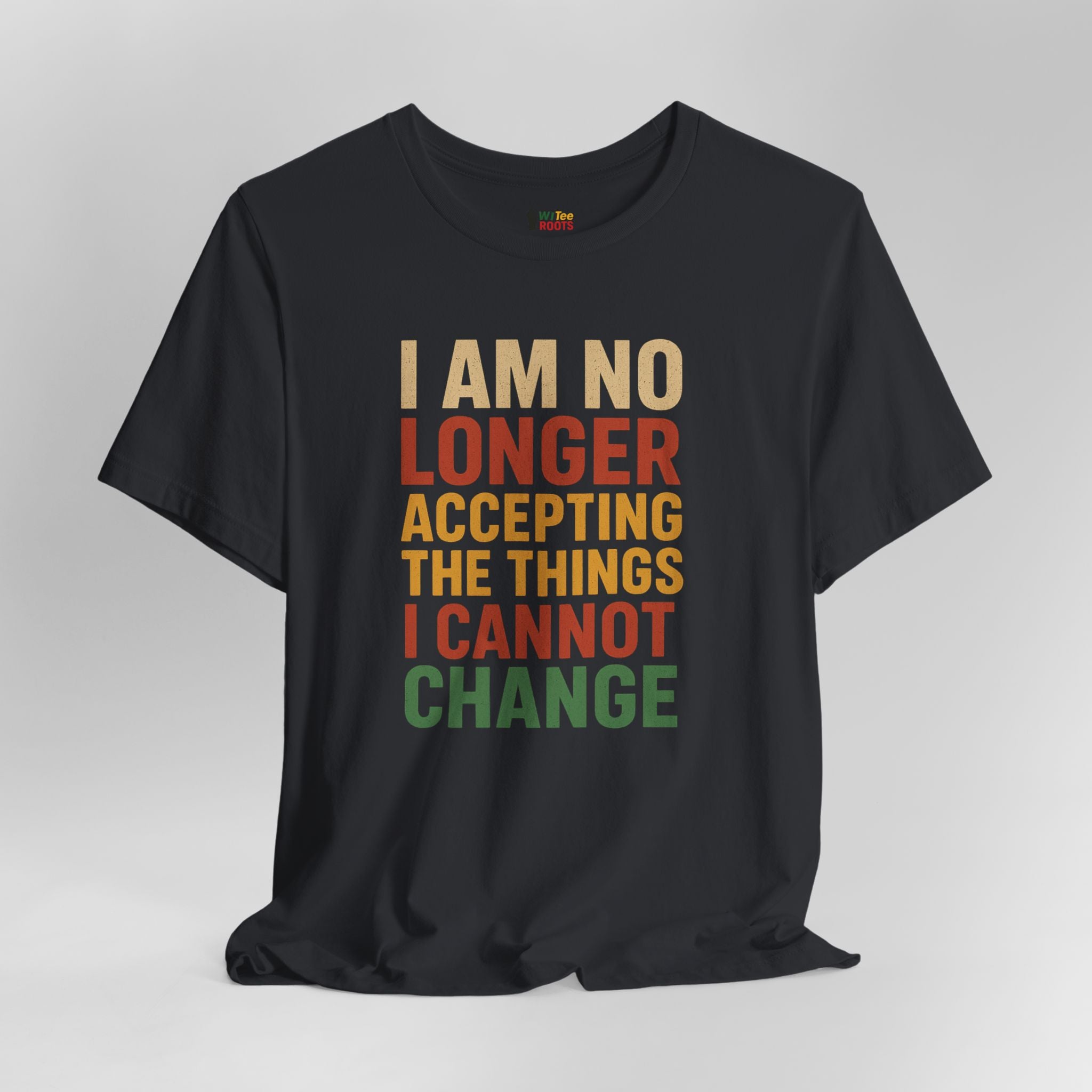 Black t-shirt with motivational quote in colorful letters on a gray background