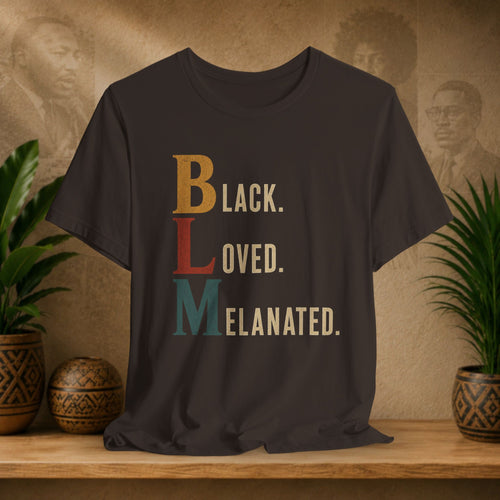 A brown t-shirt with a retro-style graphic reading 'Black. LOVED.
