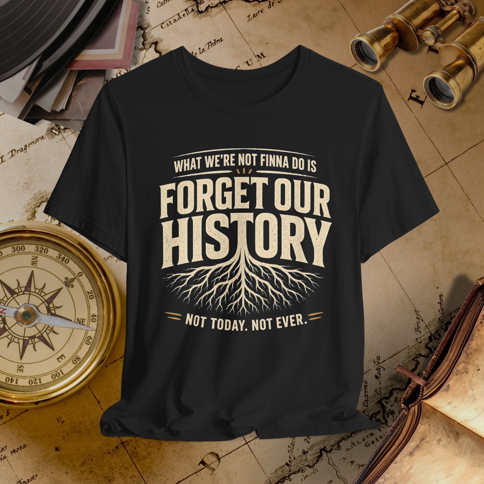 Black t-shirt with 'Forget Our History' design on a vintage map background