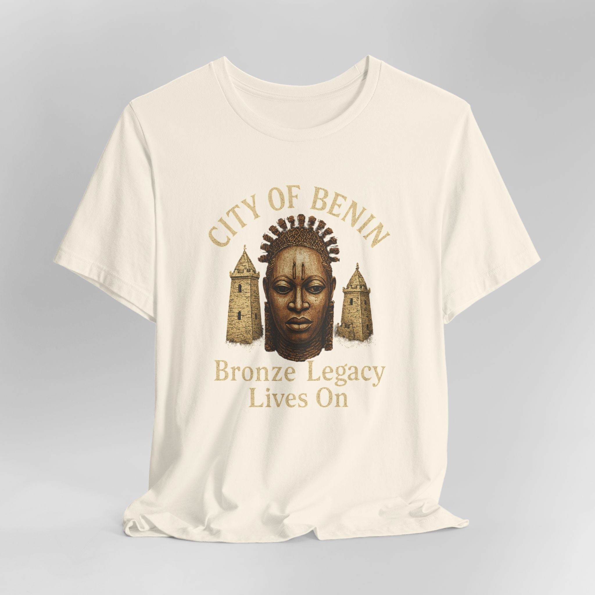 Beige t-shirt with graphic design and text on a gray background