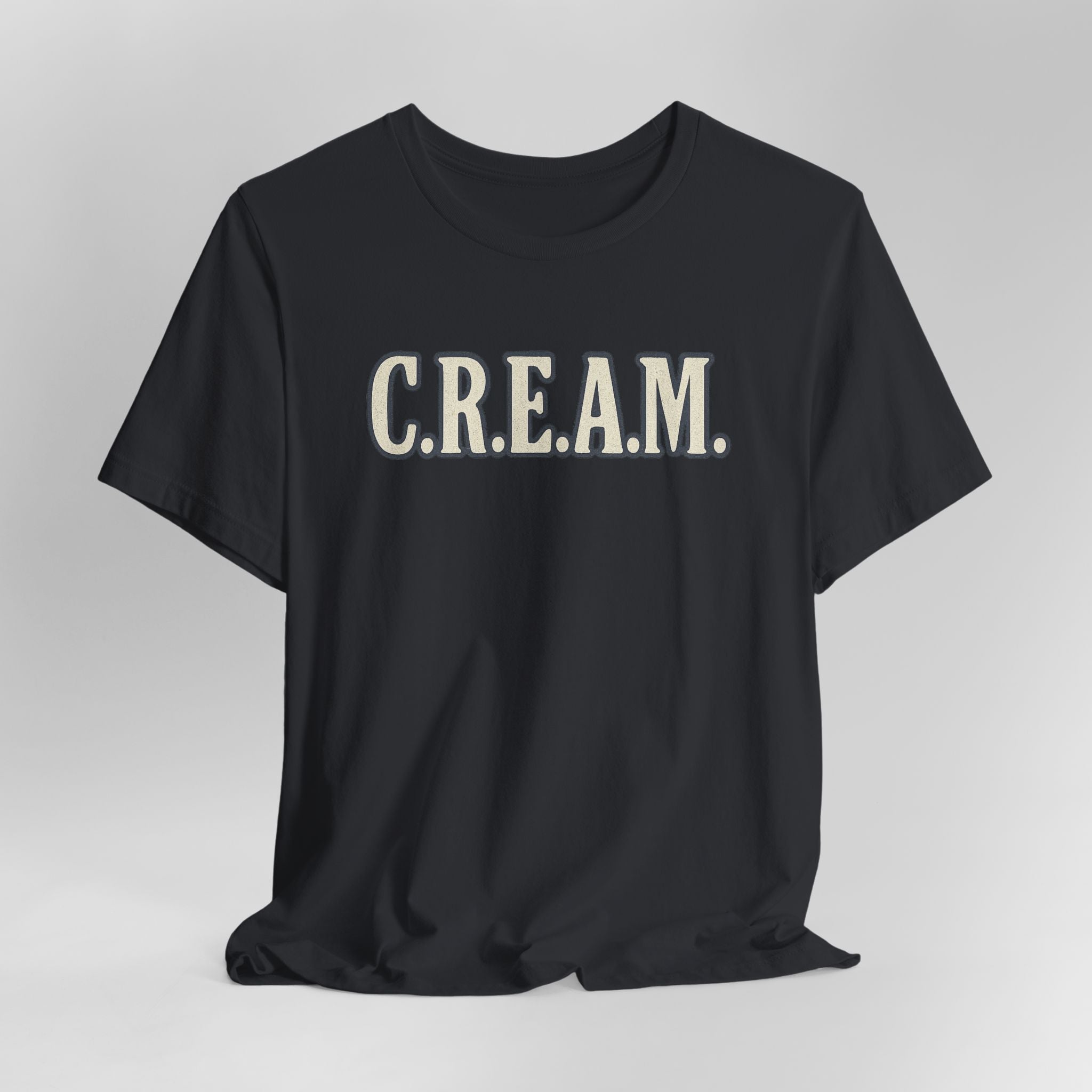 Black t-shirt with 'C.R.E.A.M.' text on a gray background