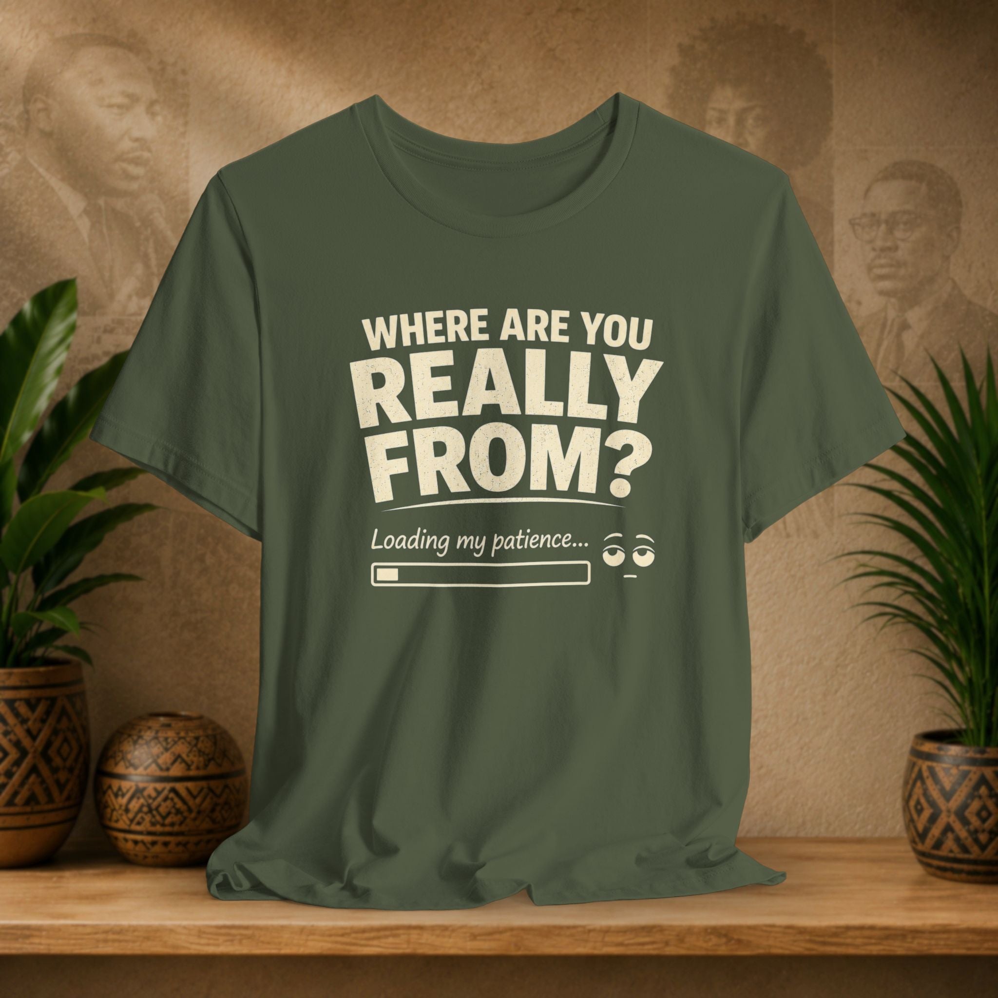 Green t-shirt with humorous text design on a wooden surface with plants and a textured wall background