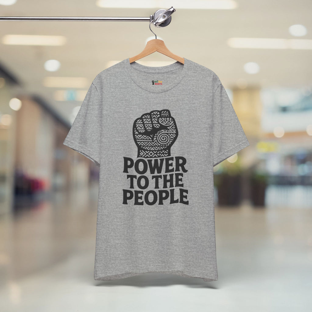 Gray t-shirt with 'Power to the People' design on a hanger in a store.