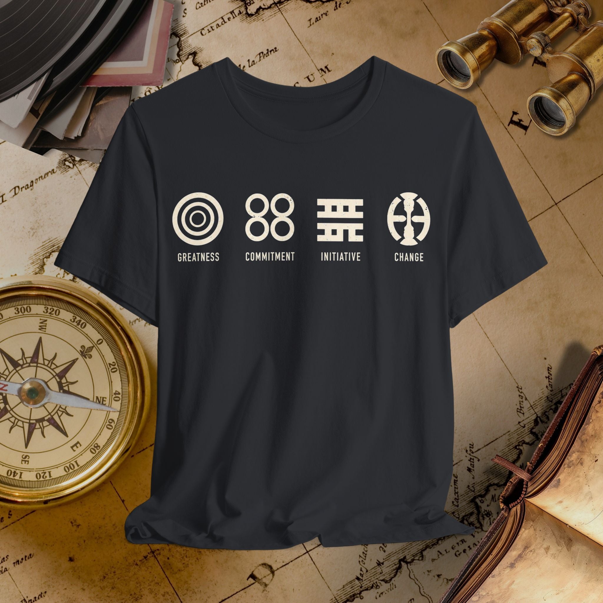 Black t-shirt with white graphics and text on a vintage map background