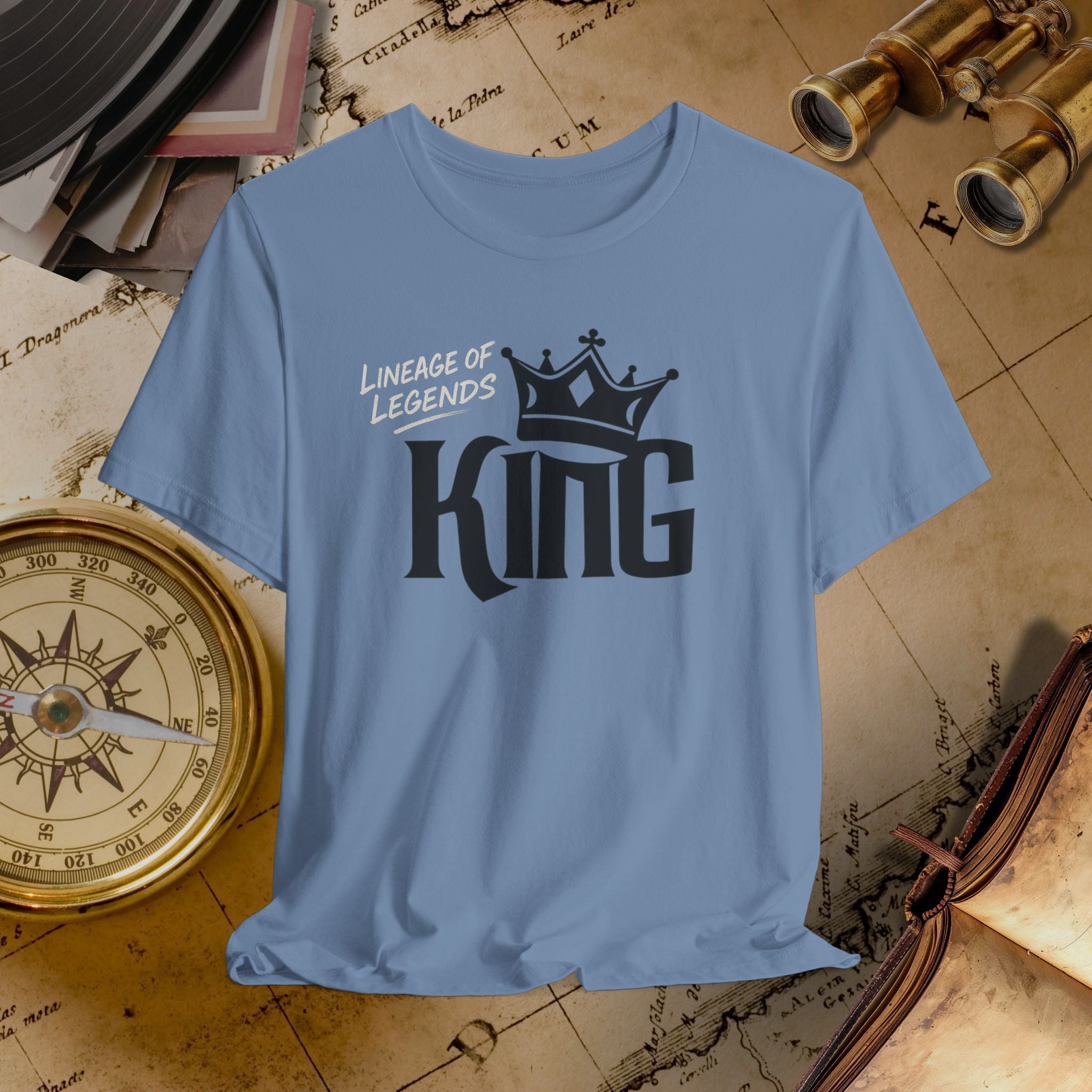 Blue t-shirt with 'King' design on a vintage map background