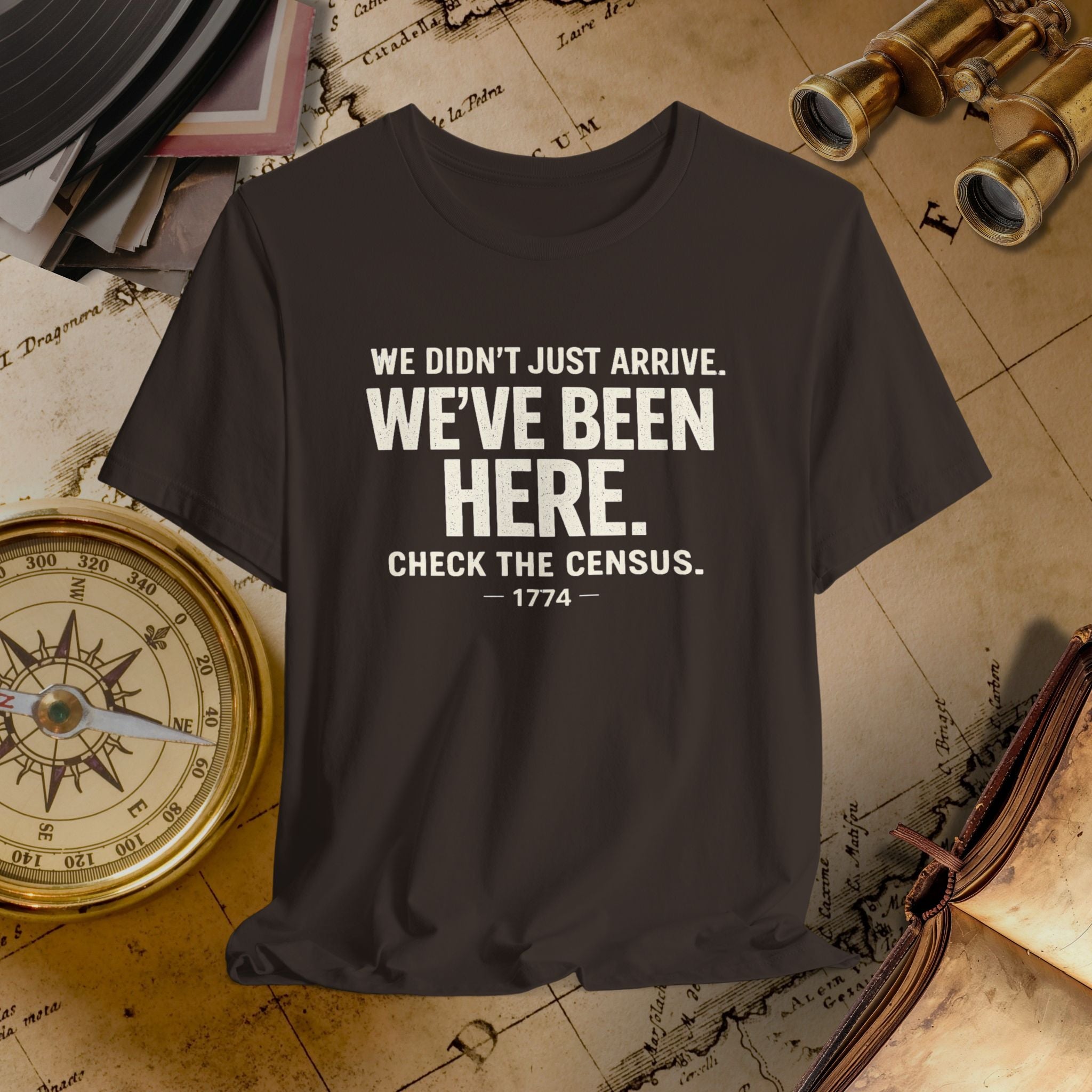 Brown t-shirt with humorous text on a vintage map background