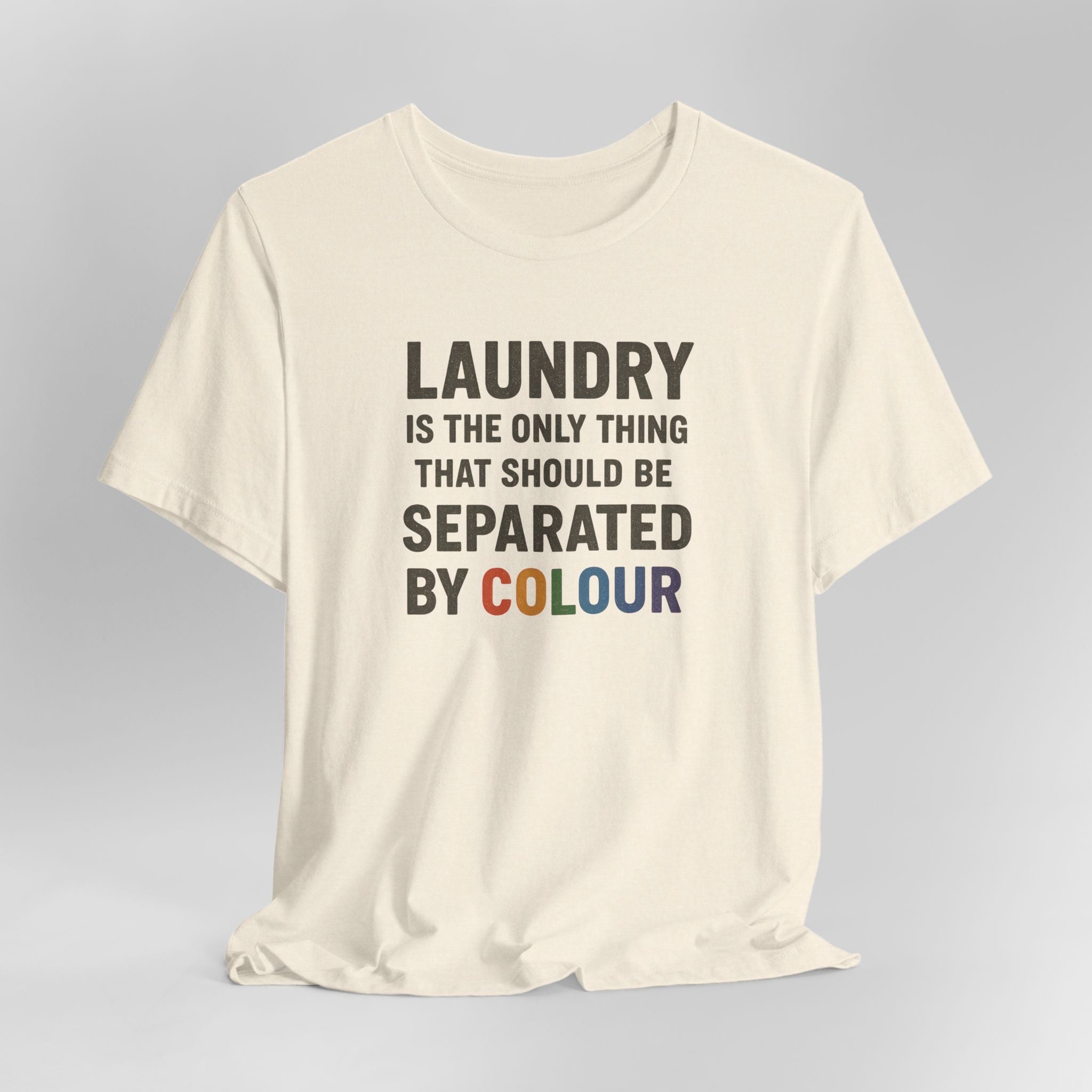 Beige t-shirt with humorous text design on a gray background