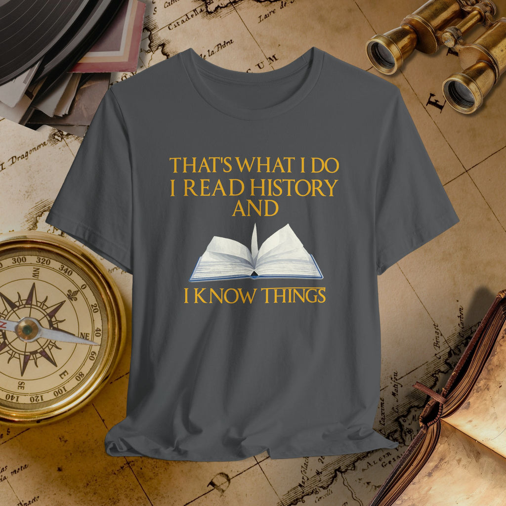 Gray t-shirt with 'I Read History and I Know Things' text and book graphic on a historical-themed background.