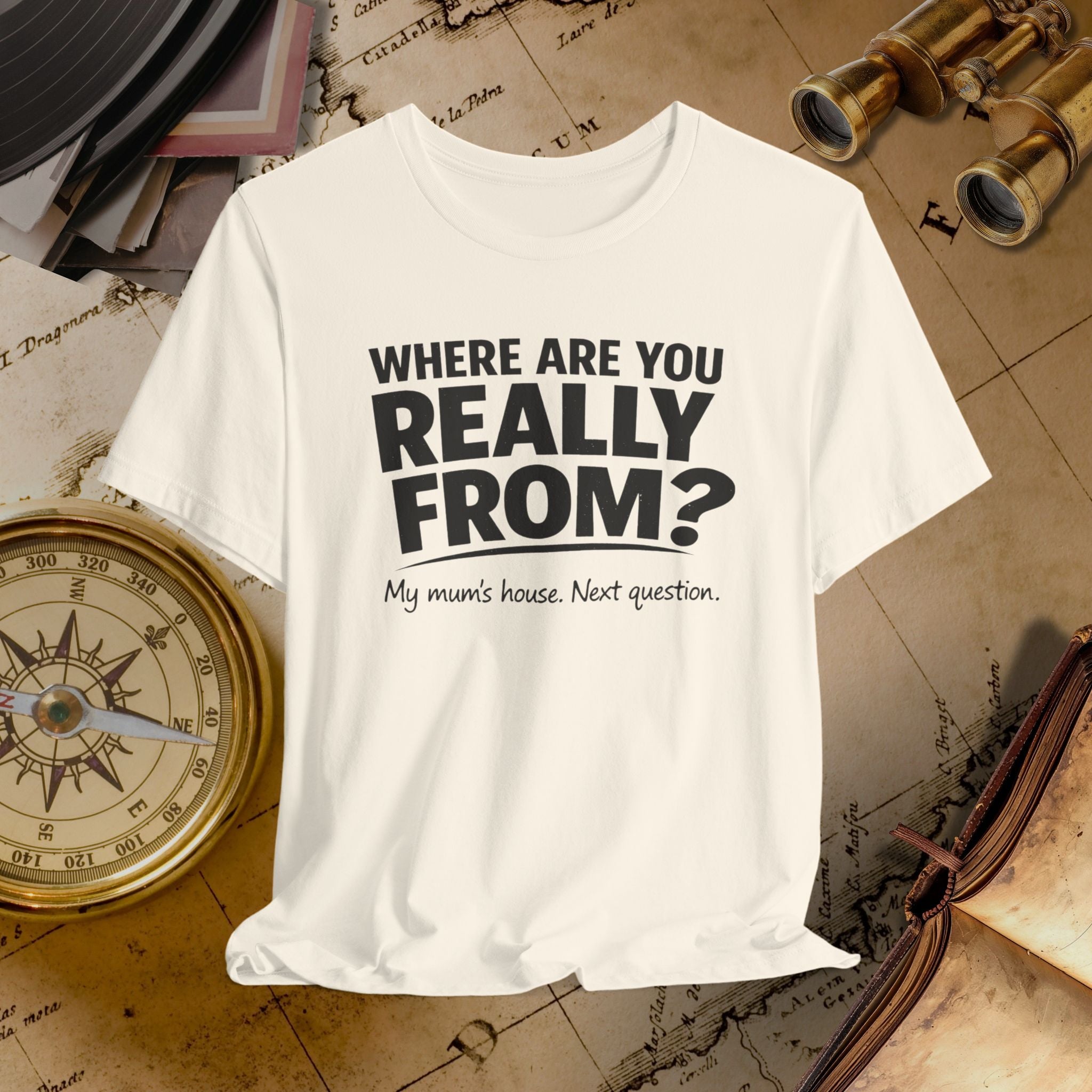 Beige t-shirt with humorous text on a vintage map background