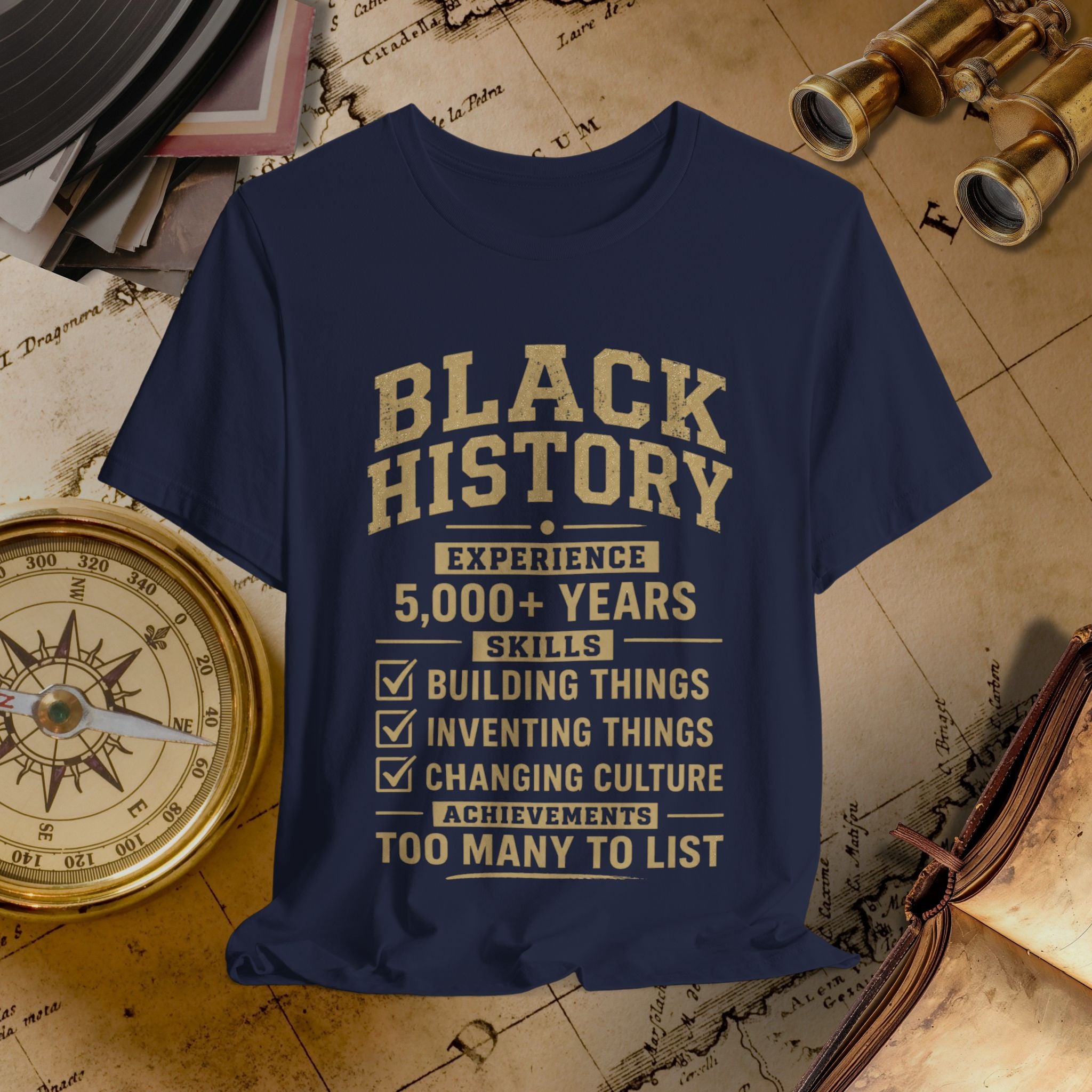 Navy blue t-shirt with 'Black History' text on a vintage map background