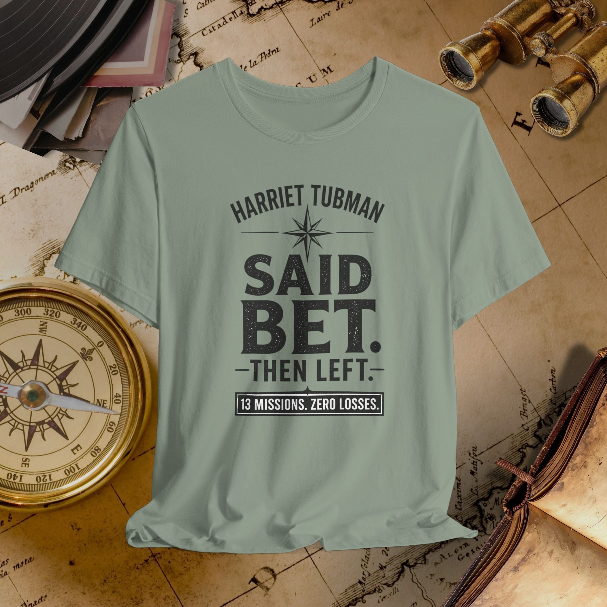 Light green t-shirt with text on a vintage map background