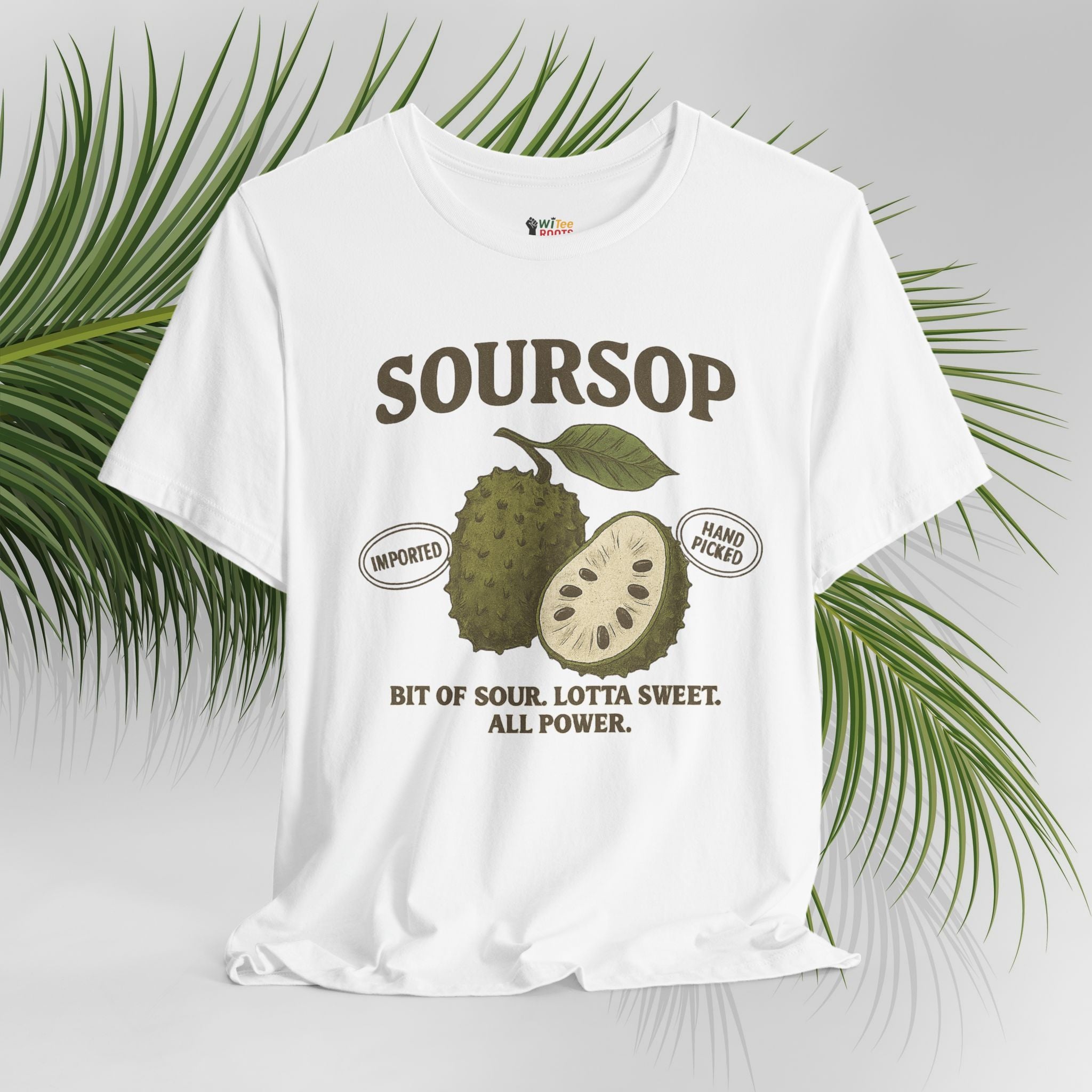 White t-shirt with soursop graphic and text on a light gray background with green leaves.