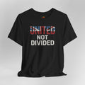 Black t-shirt with 'UNITED NOT DIVIDED' text on a gray background