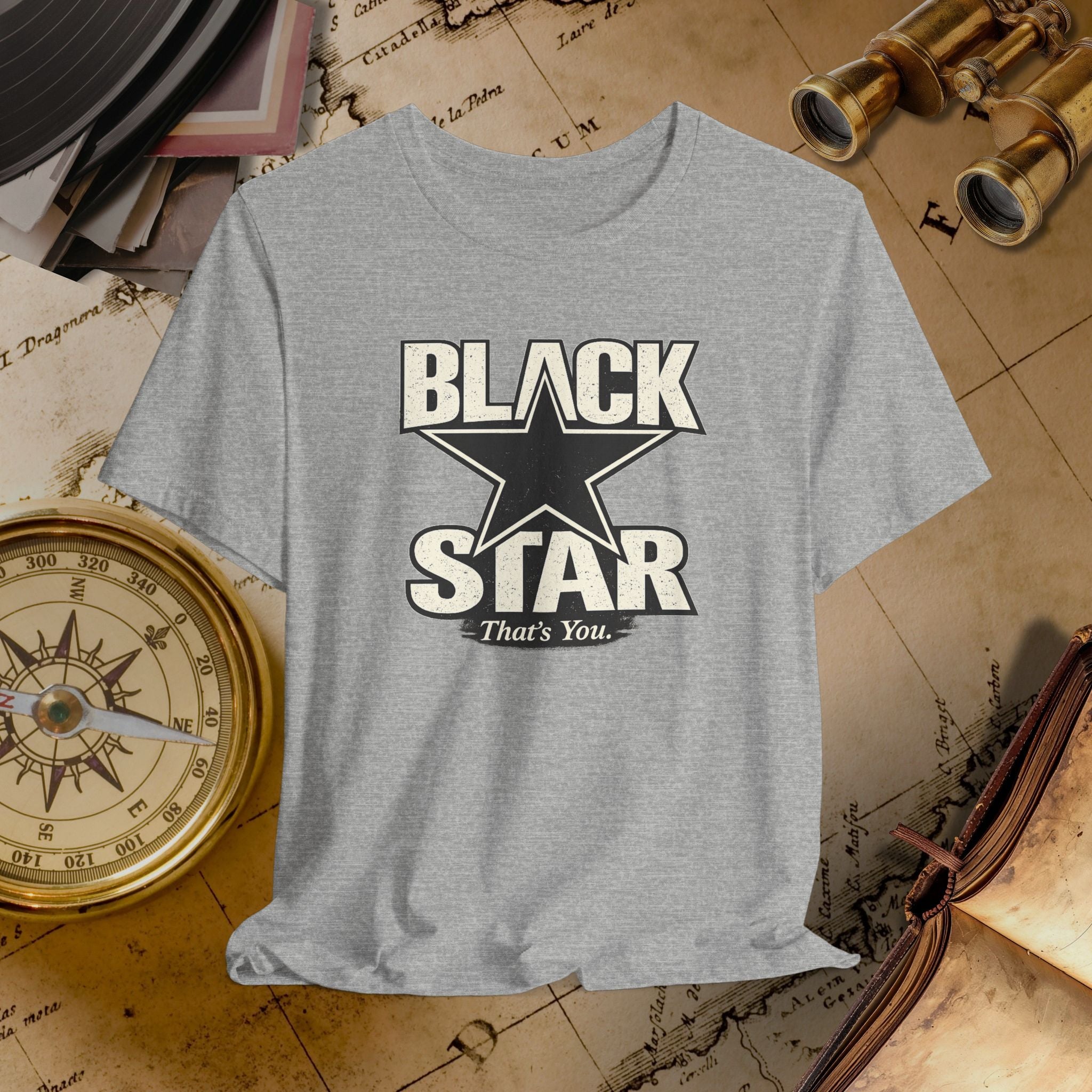Gray t-shirt with 'Black Star That's You' design on a vintage map background