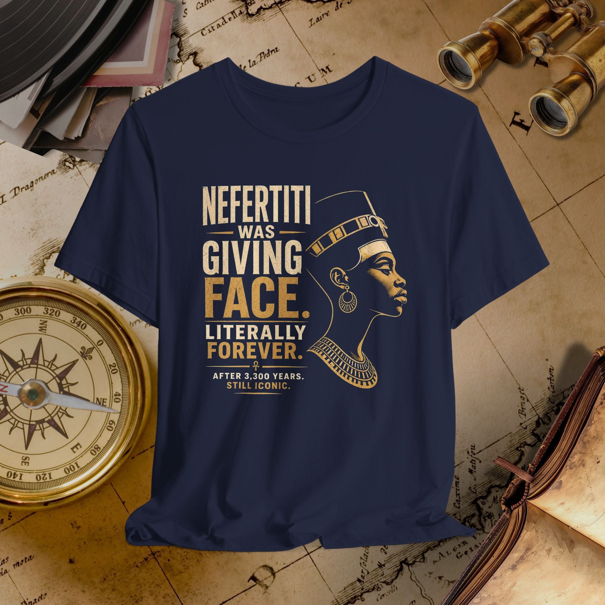 Navy blue t-shirt with gold text and graphic of a historical figure on a vintage map background.