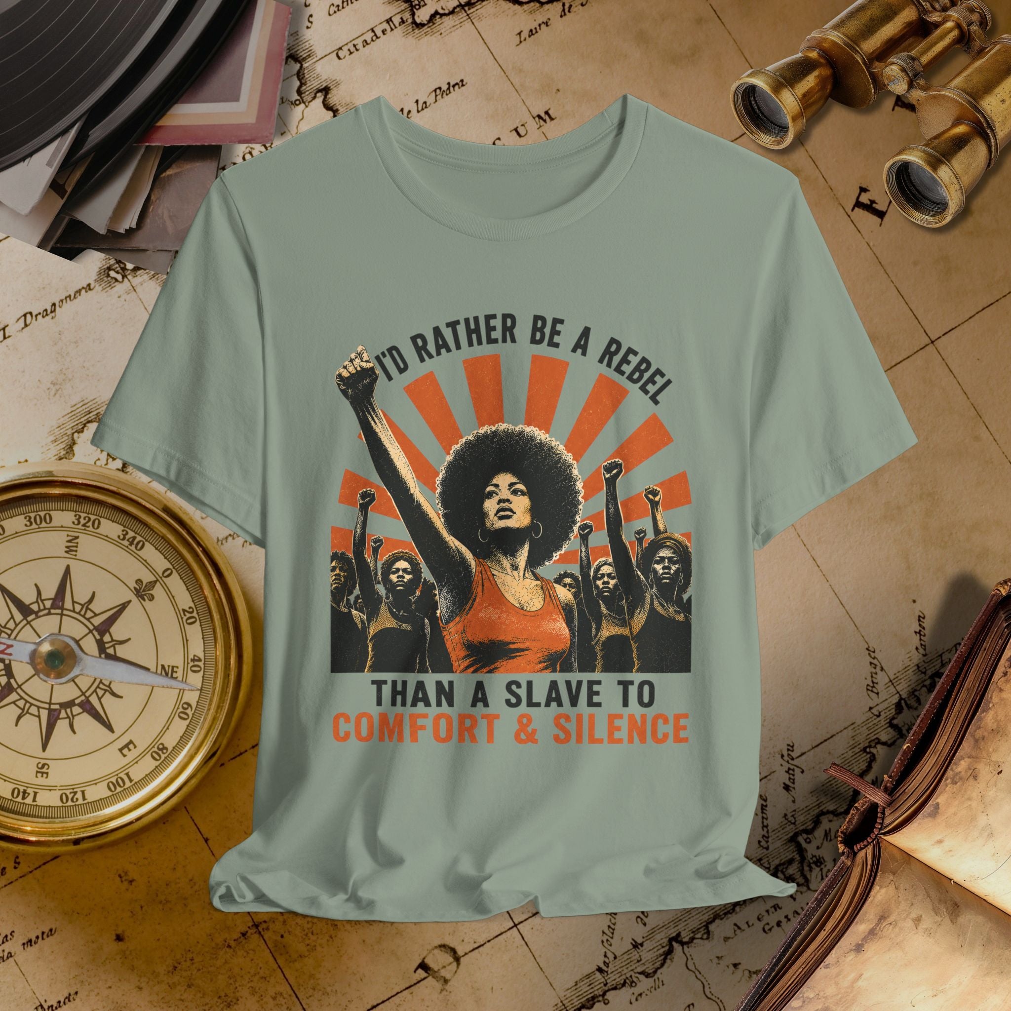 T-shirt with graphic design of a woman raising her fist on a vintage map background