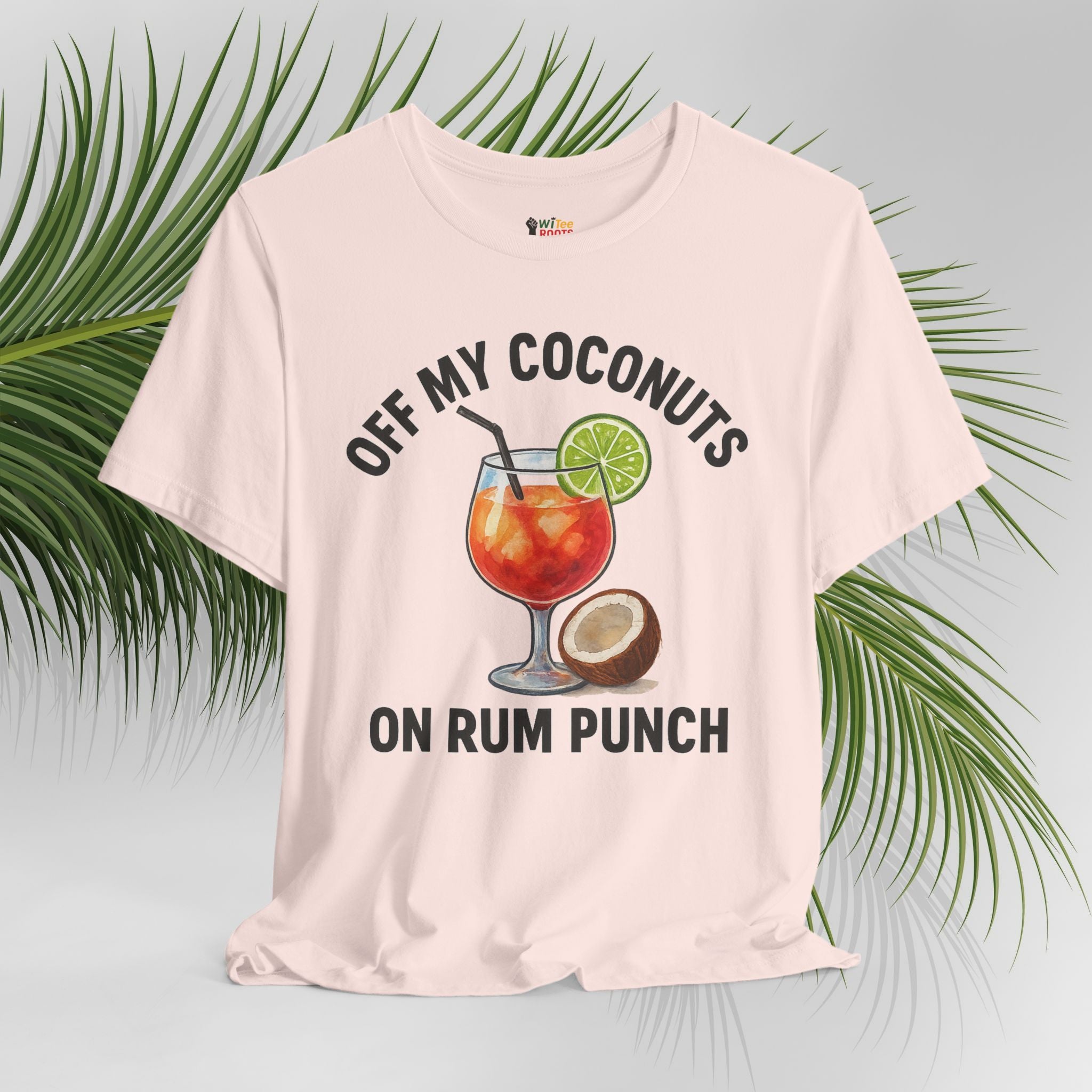 Beige t-shirt with a graphic of a drink and coconuts on a light gray background with palm leaves.