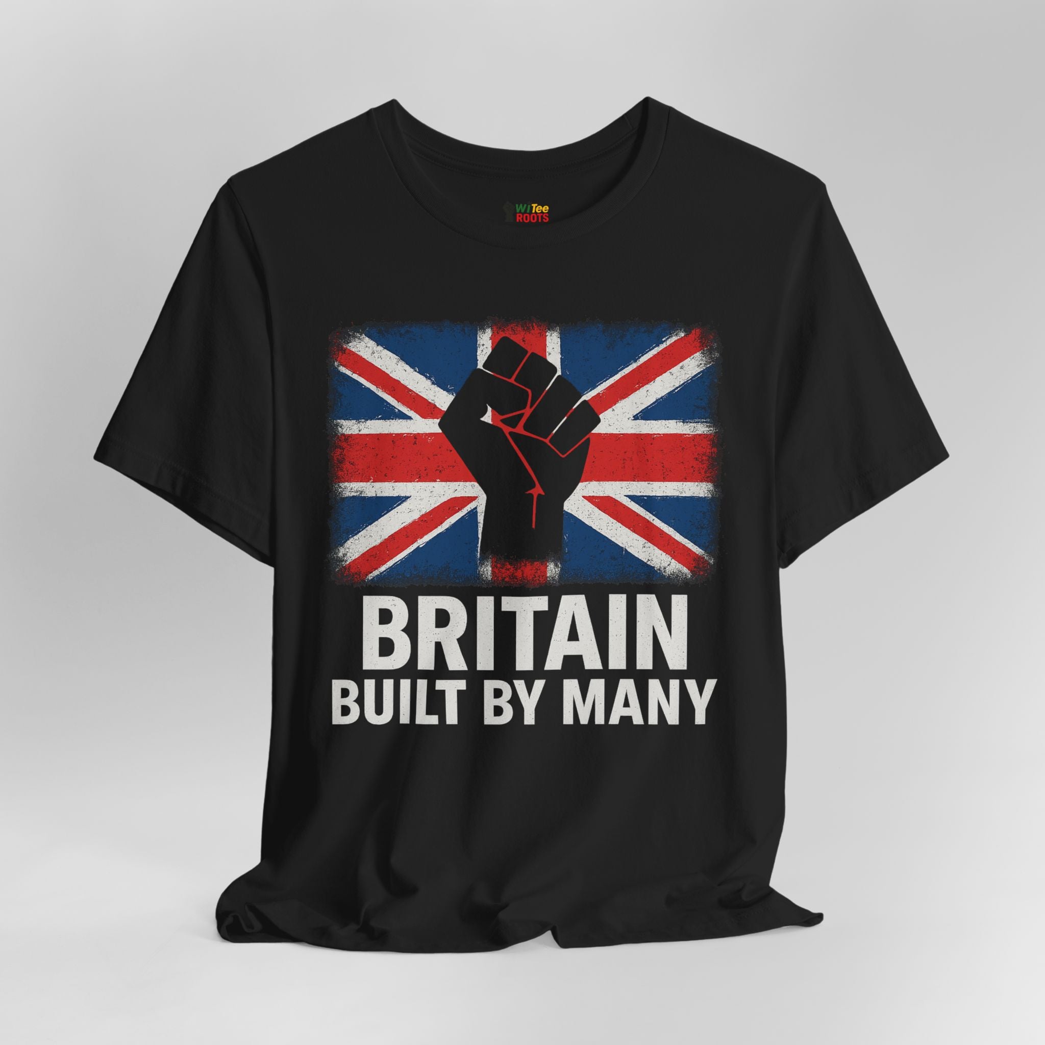 Black t-shirt with Union Jack design and text 'Britain Built by Many' on a gray background