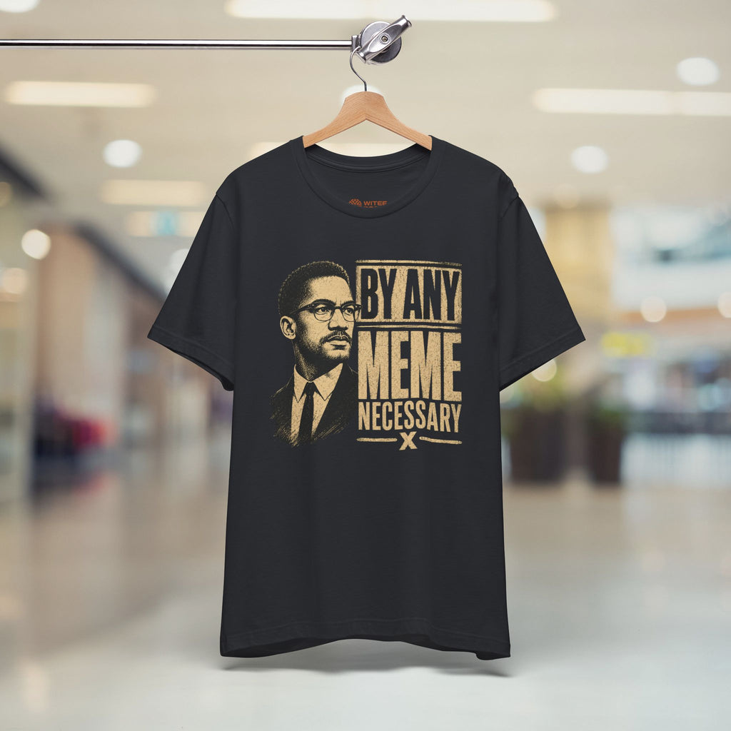 Black t-shirt with graphic design and text on a hanger in a store setting