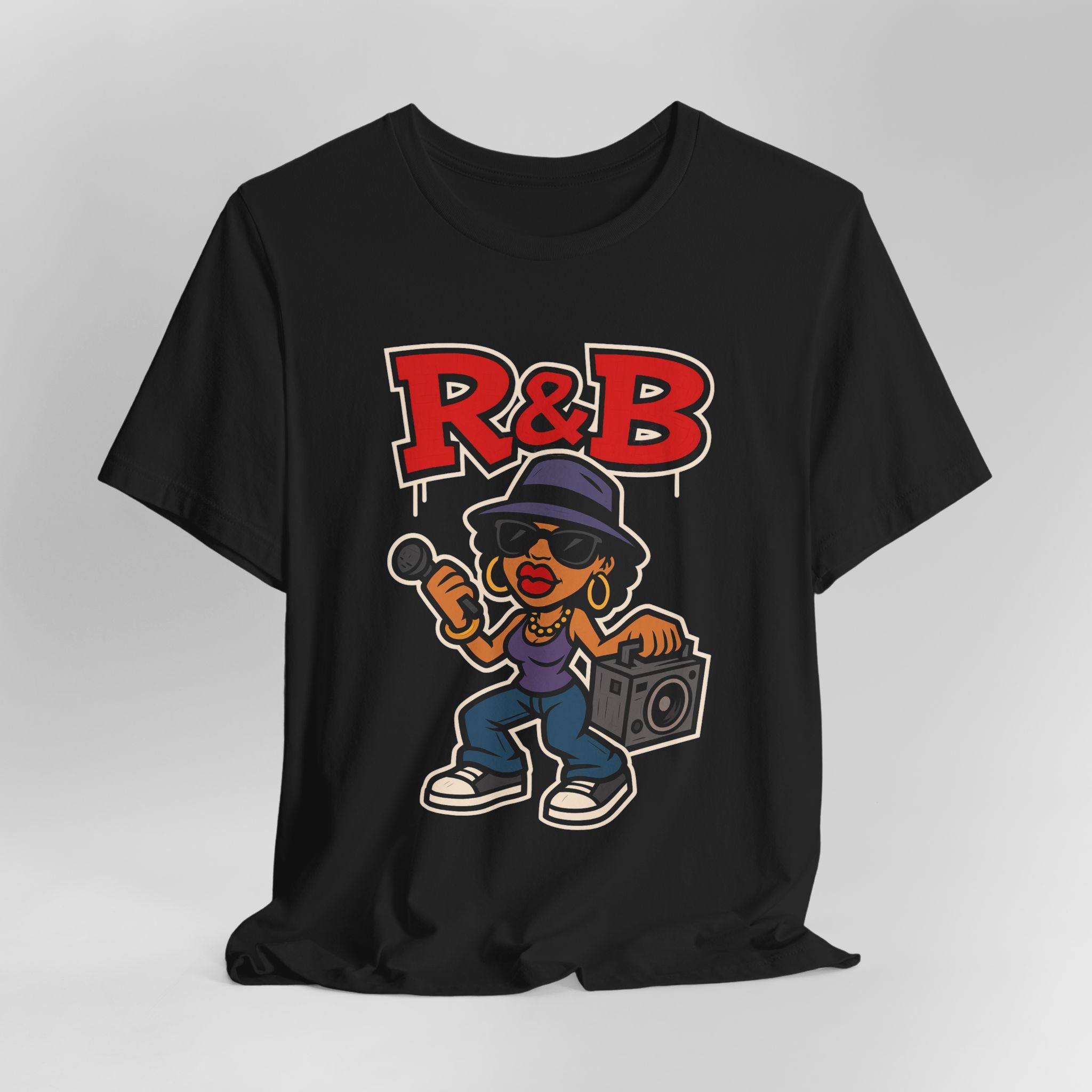 Black t-shirt with R&B graphic design featuring a cartoon character holding a boombox on a gray background