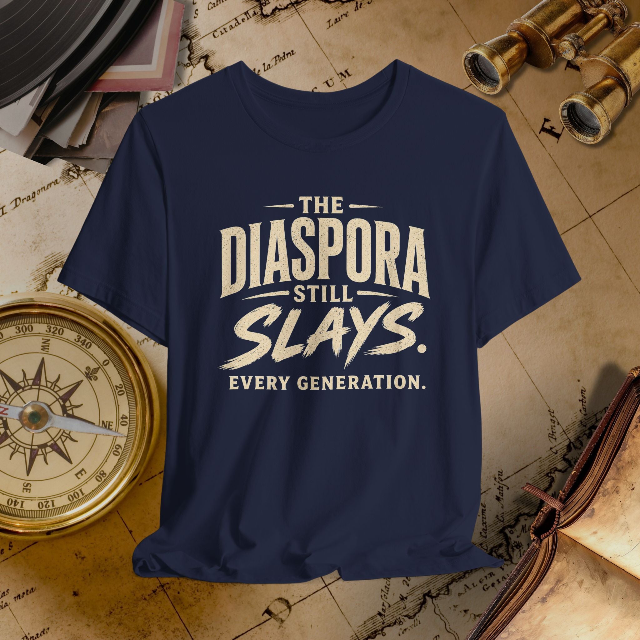 Navy t-shirt with 'The Diaspora Still Slays Every Generation' text on a vintage map background.