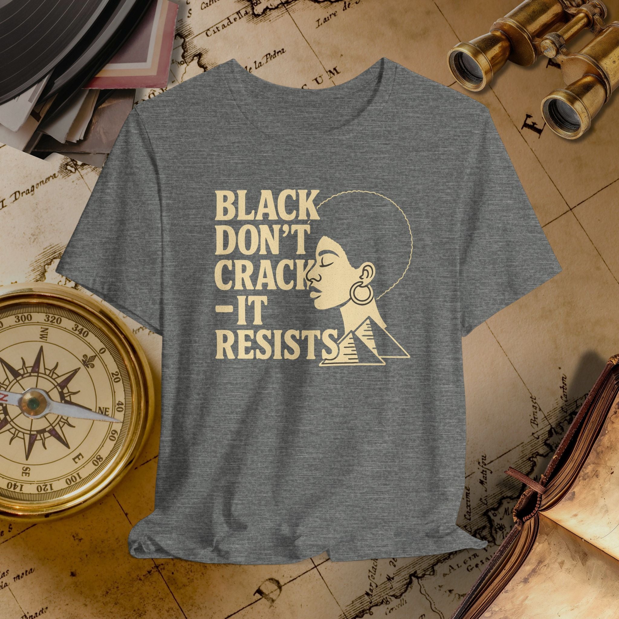 Grey t-shirt with text on a vintage map background
