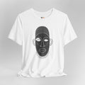 White t-shirt with black mask design on a gray background