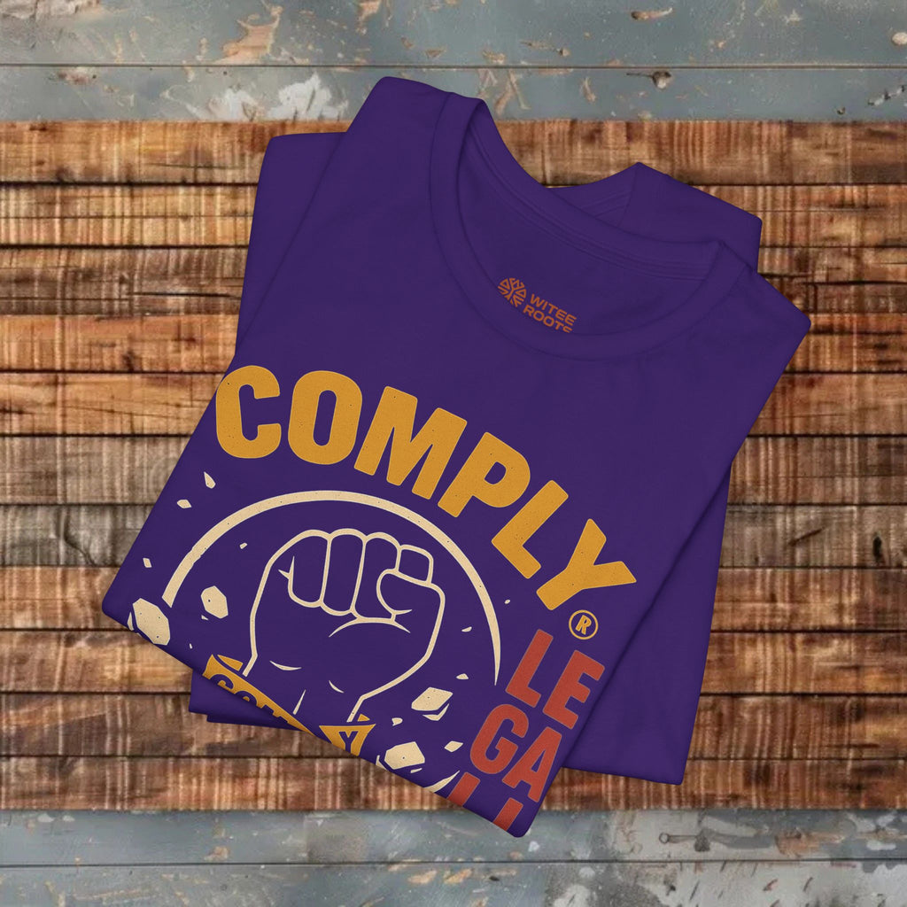 Folded purple t-shirt with yellow and white text and graphics on a wooden surface