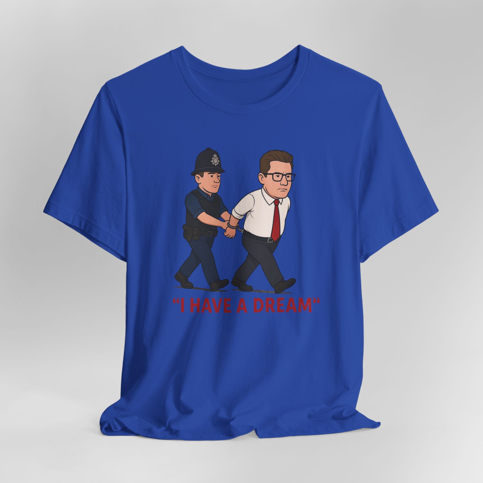 Blue t-shirt with a graphic of a police officer and a man being arrested, with 'I Have a Dream' text.