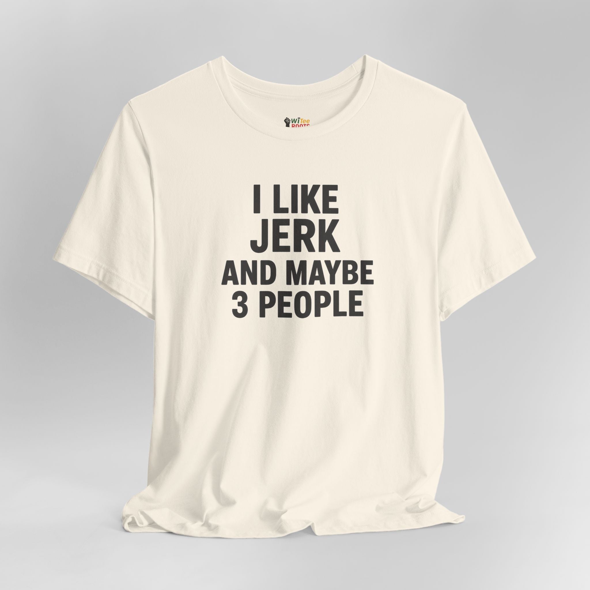 Cream t-shirt with black text 'I LIKE JERK AND MAYBE 3 PEOPLE' on a gray background