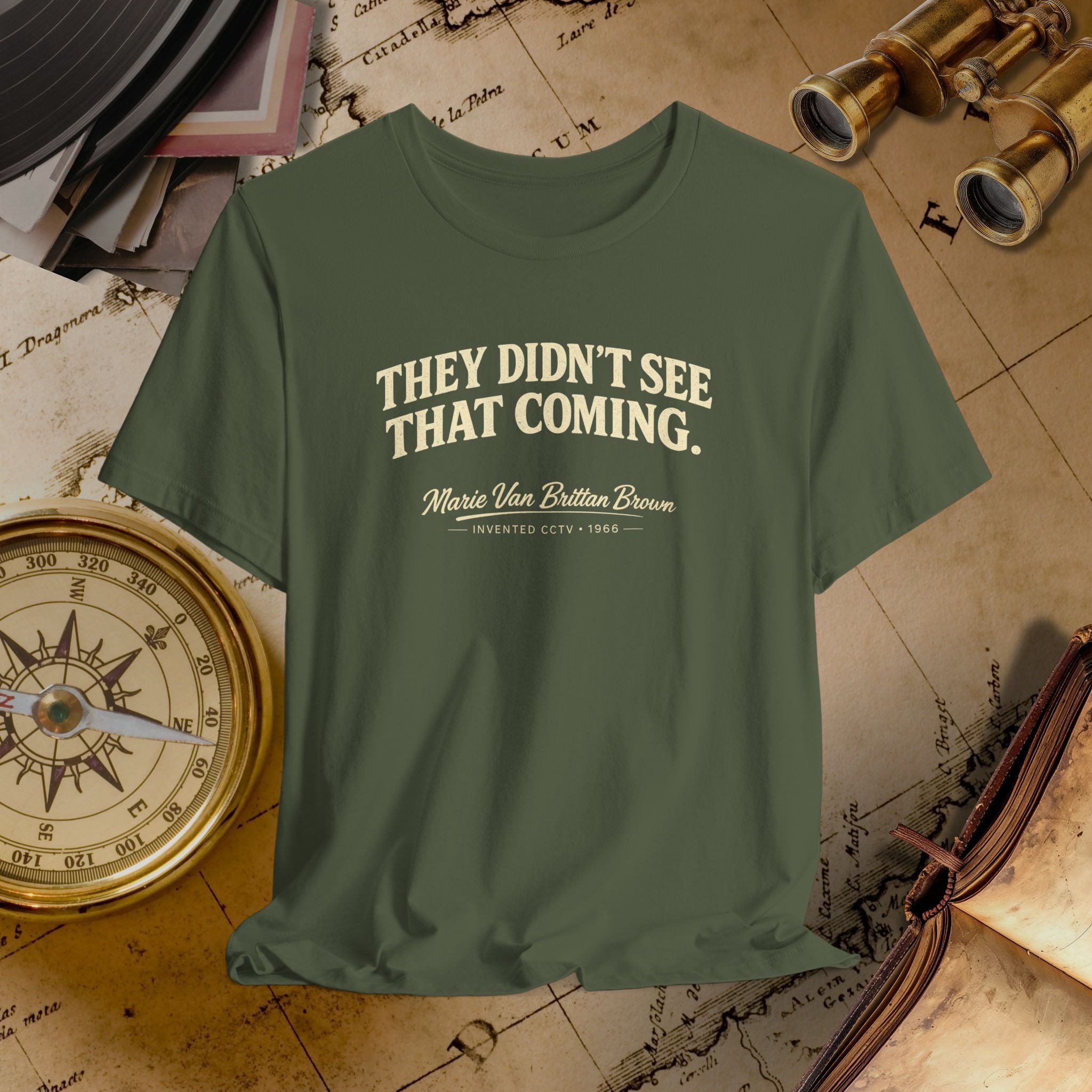 Green t-shirt with text on a vintage map background