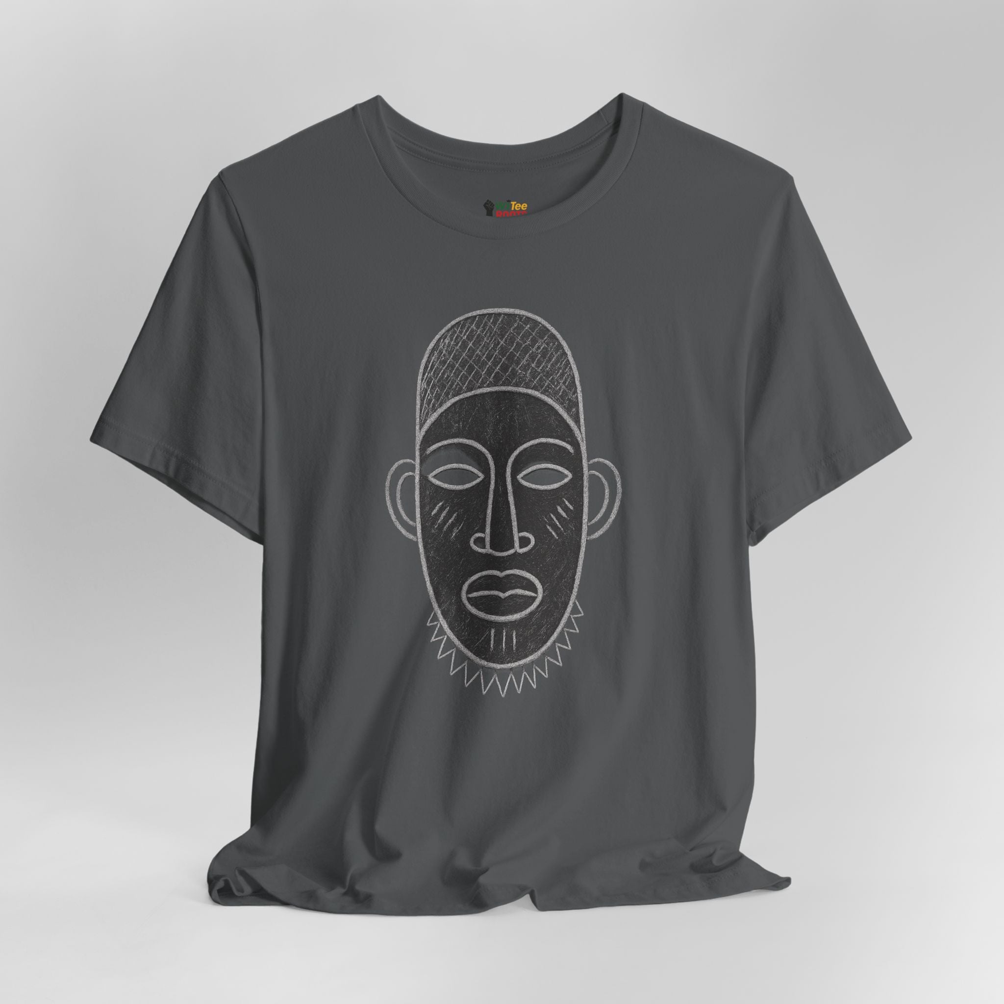 Gray t-shirt with a face design on a gray background