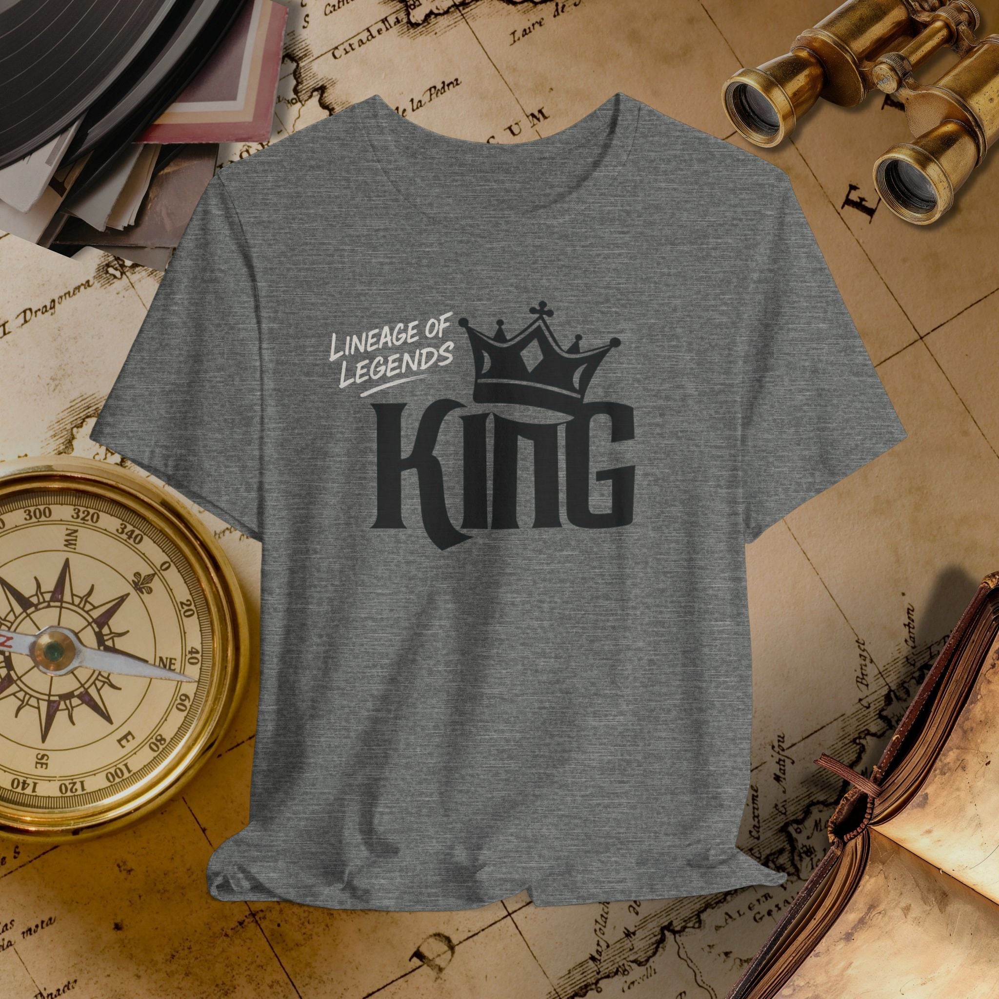 Gray t-shirt with 'King' design on a vintage map background