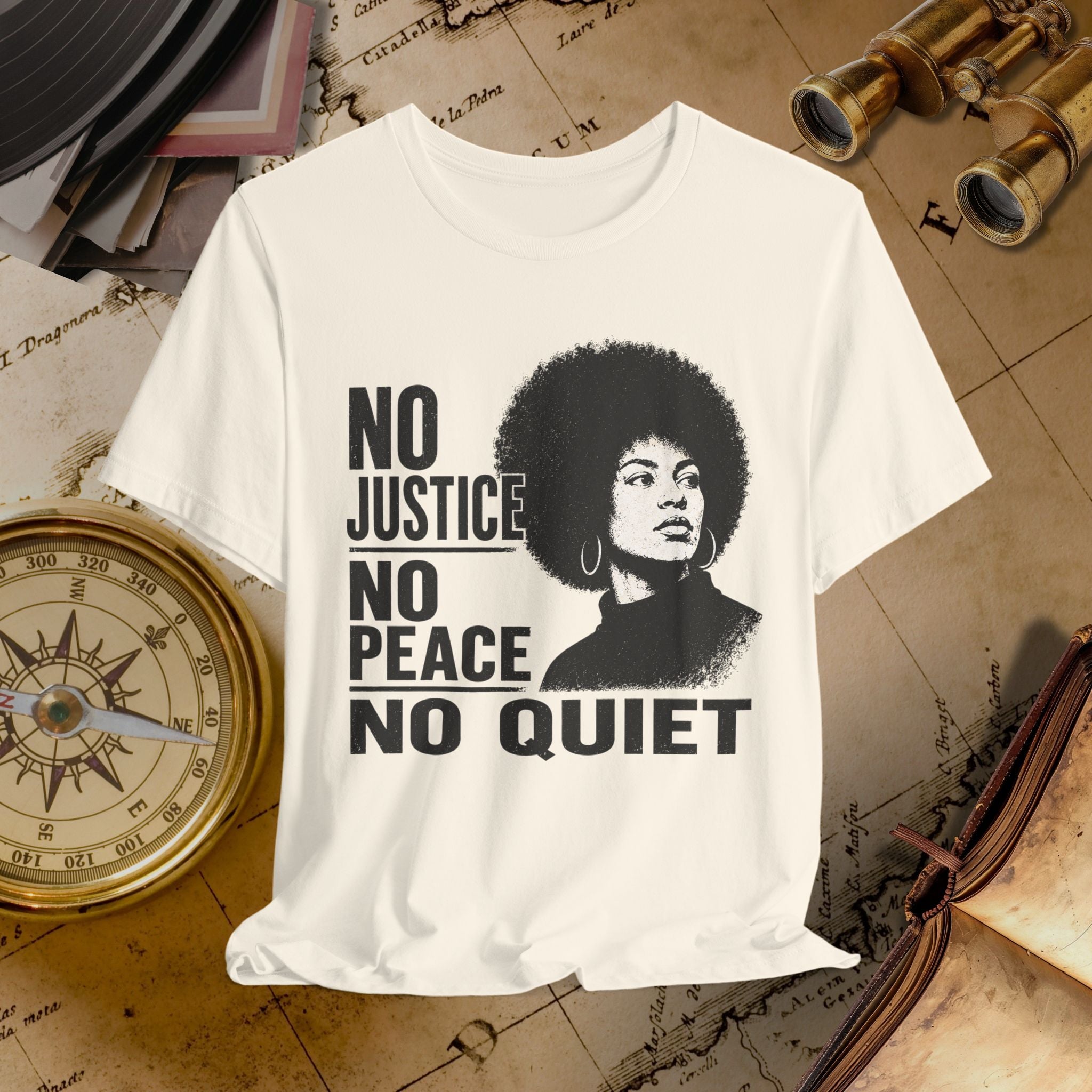 Beige t-shirt with a graphic and text on a vintage map background