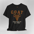 Black t-shirt with a colorful goat graphic and text on a gray background