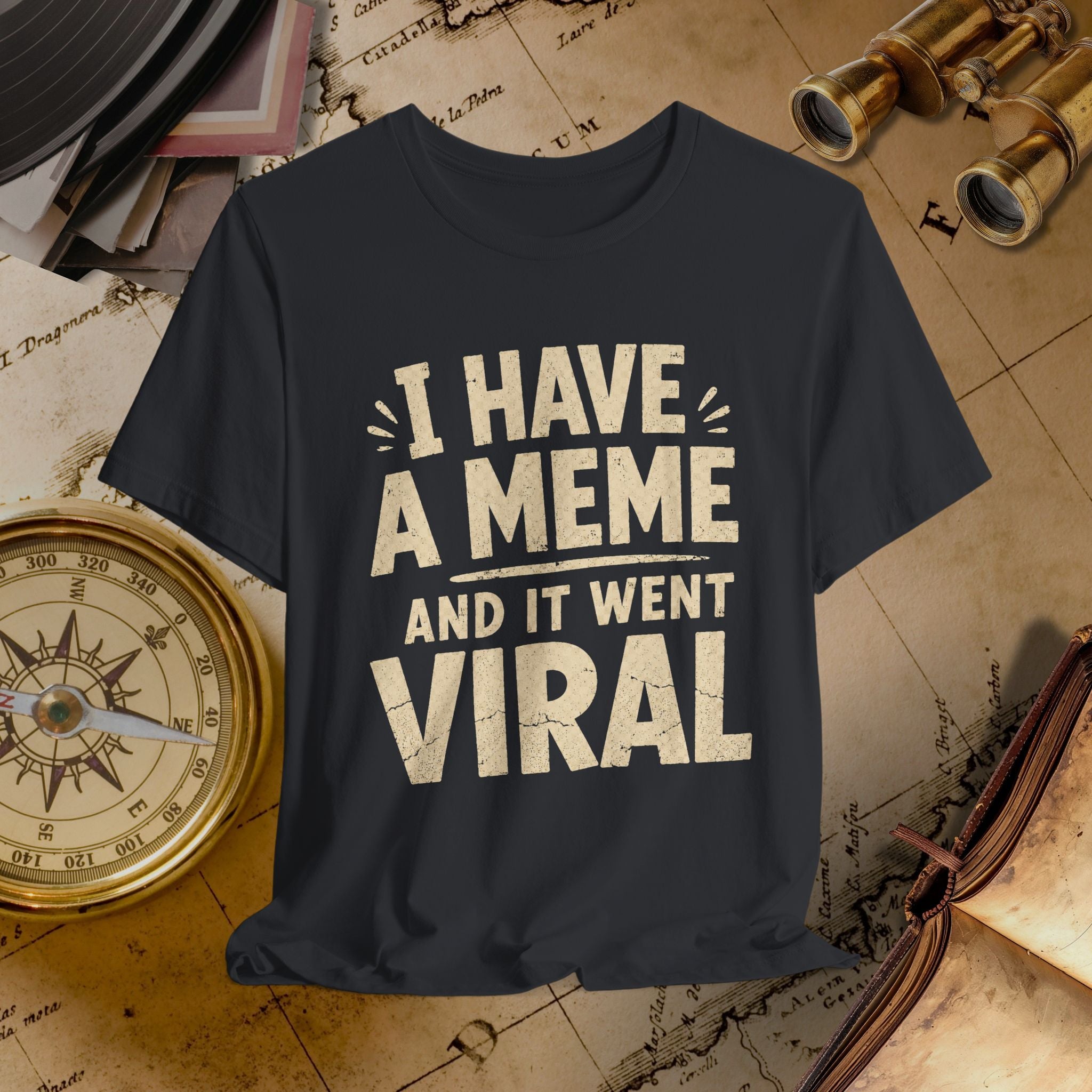 Black t-shirt with 'I have a meme and it went viral' text on a vintage map background